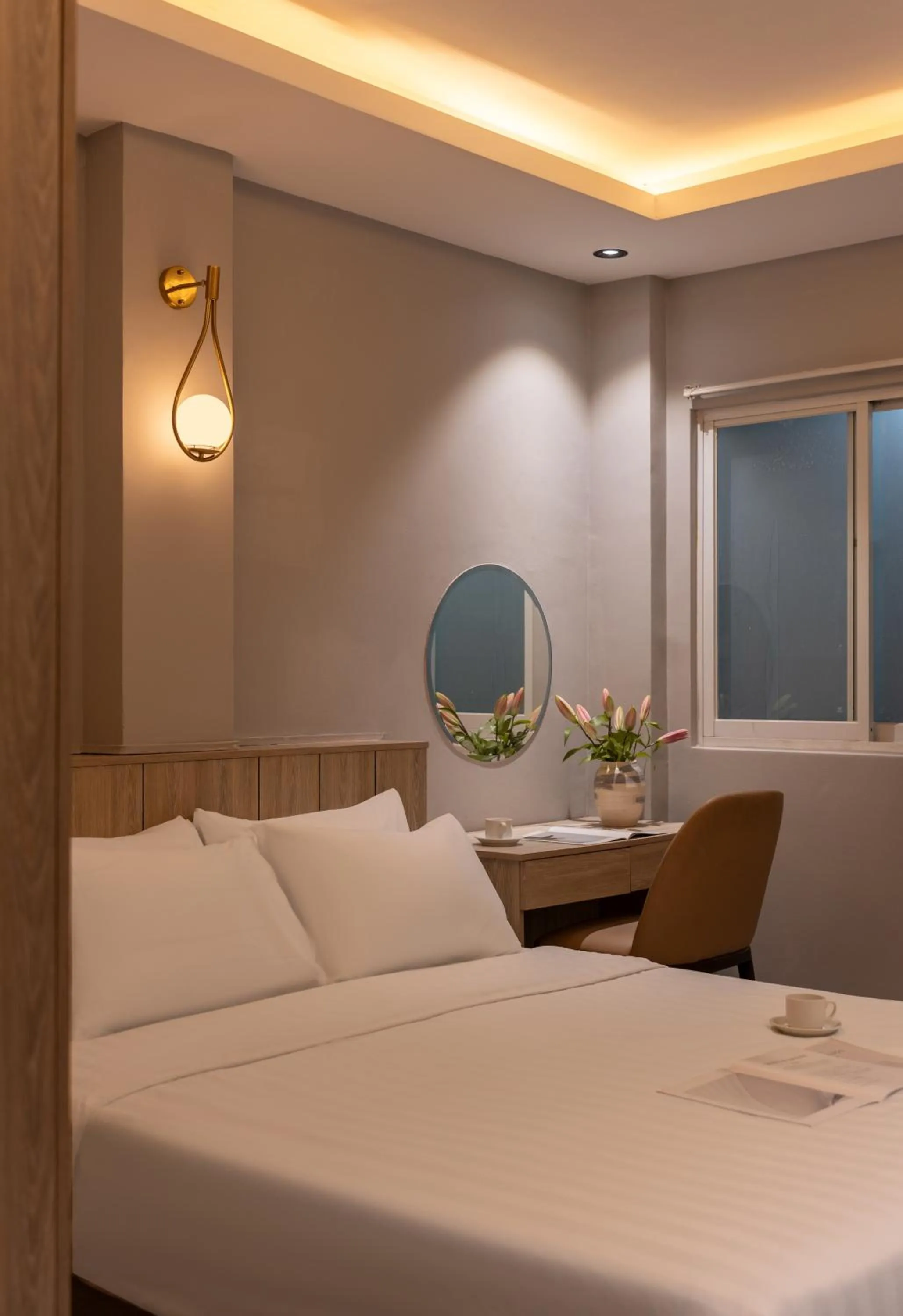 Bed in The Cozy Inn Hotel Ho Chi Minh