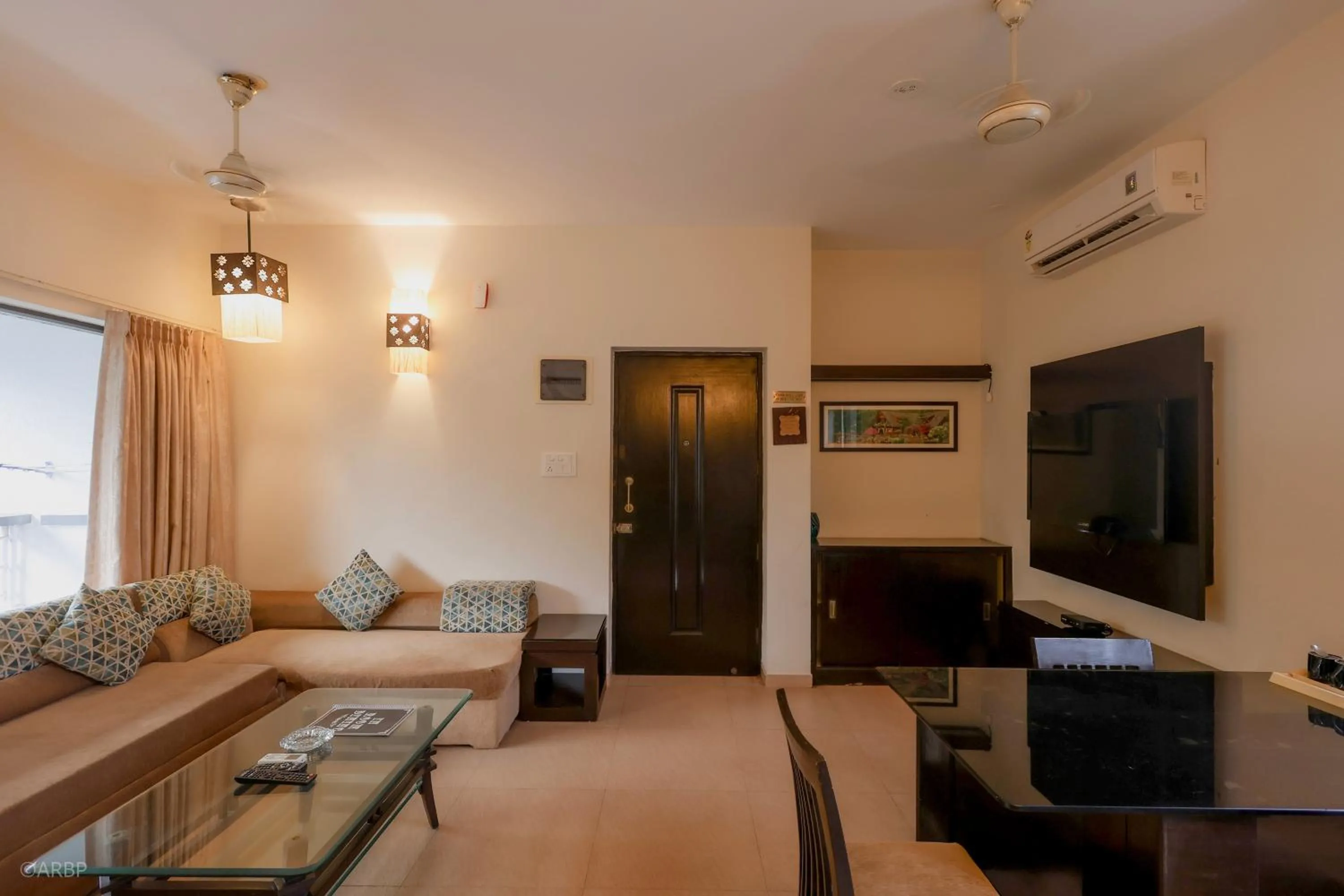 Living room, Bed in La Sunila suites Baga by WSI