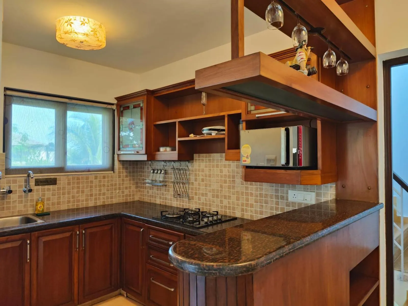 Kitchen or kitchenette in La Sunila suites Baga by WSI