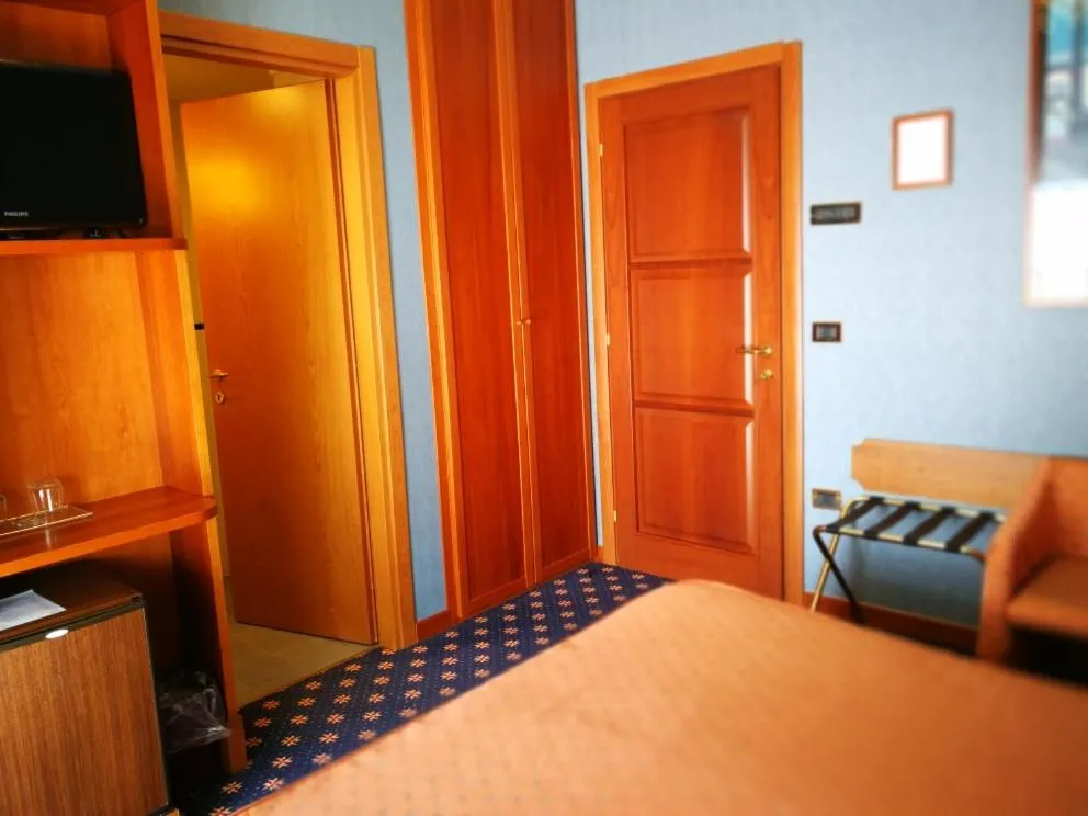 Bed in Hotel Lido - Beach and Palace