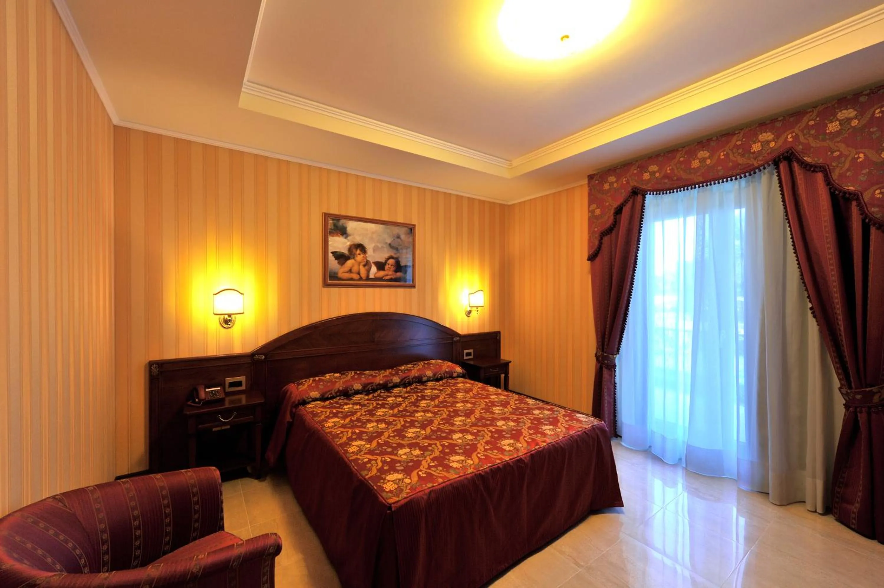 Bed in Hotel Lido - Beach and Palace