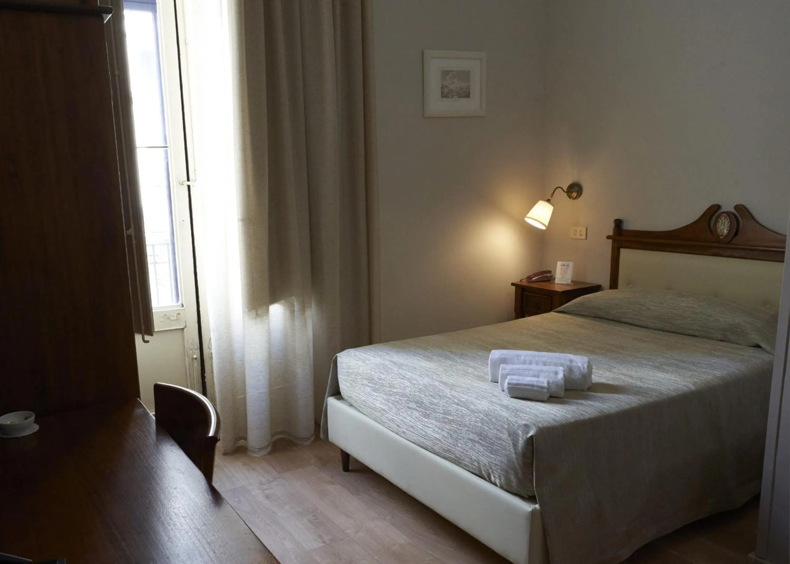 Bed in La Collegiata Guest House