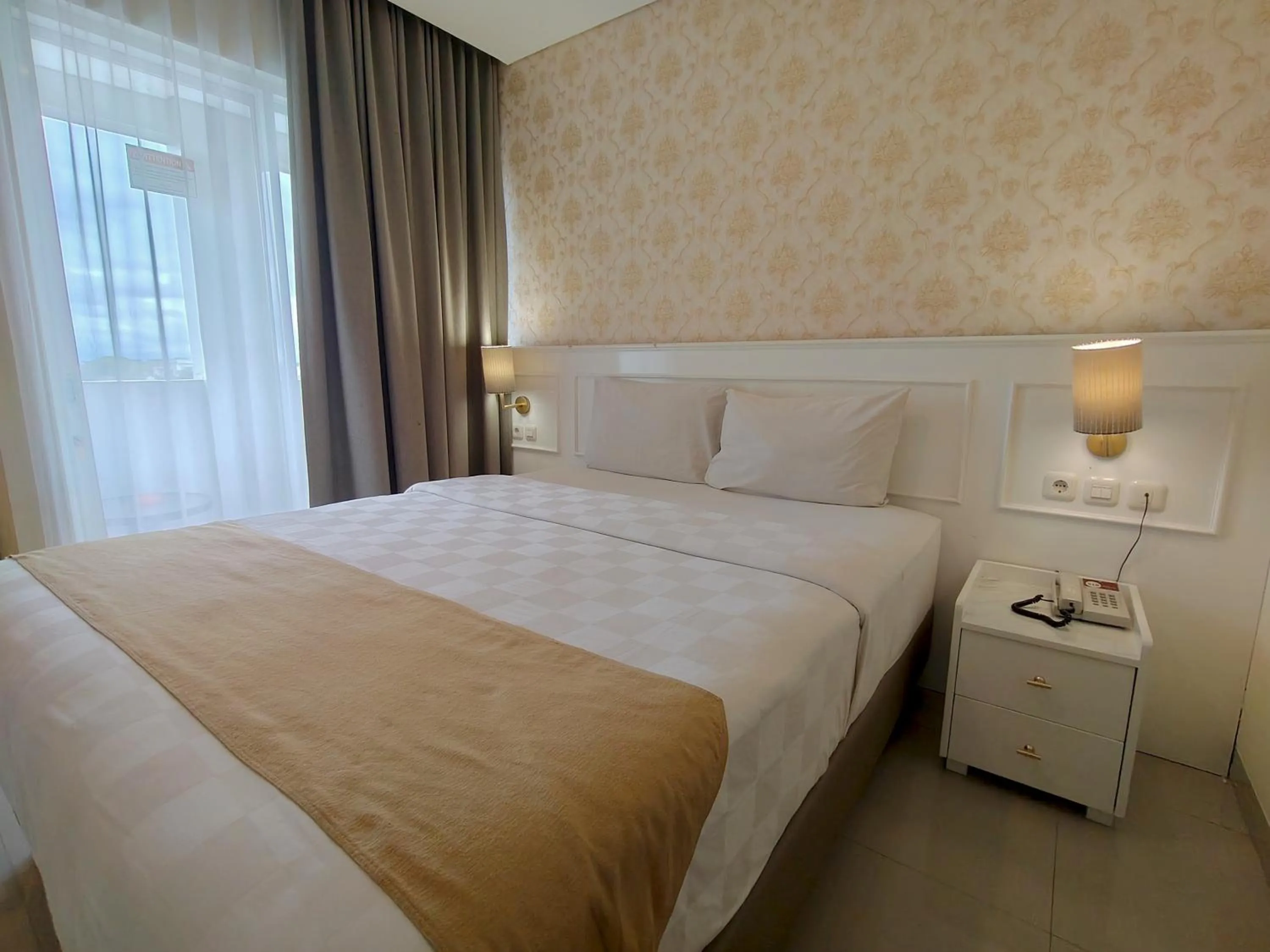 Bed in The Cube Hotel Malioboro, Azana Hotels Collection