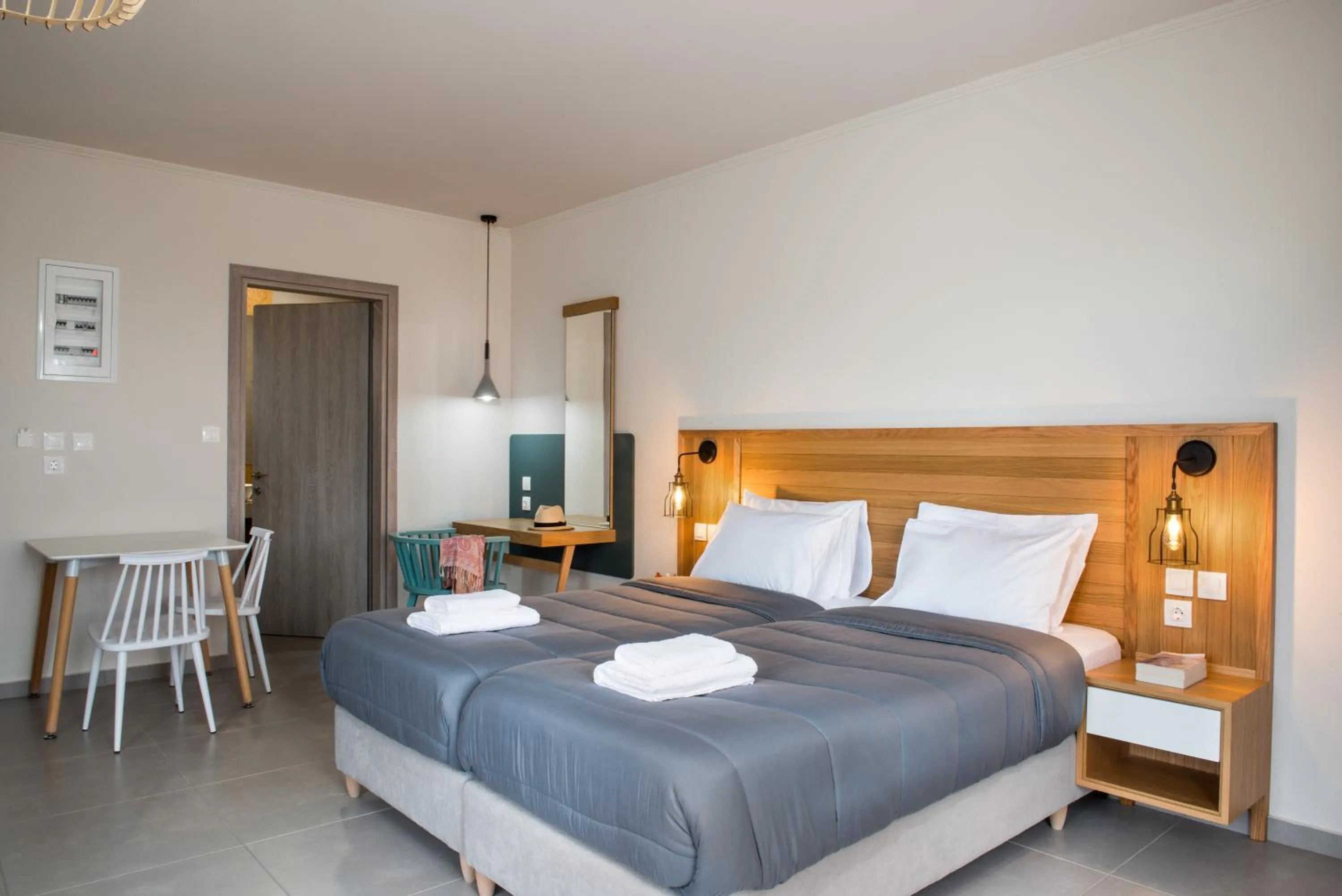 Photo of the whole room, Bed in Elafonisi Resort by Kalomirakis Family