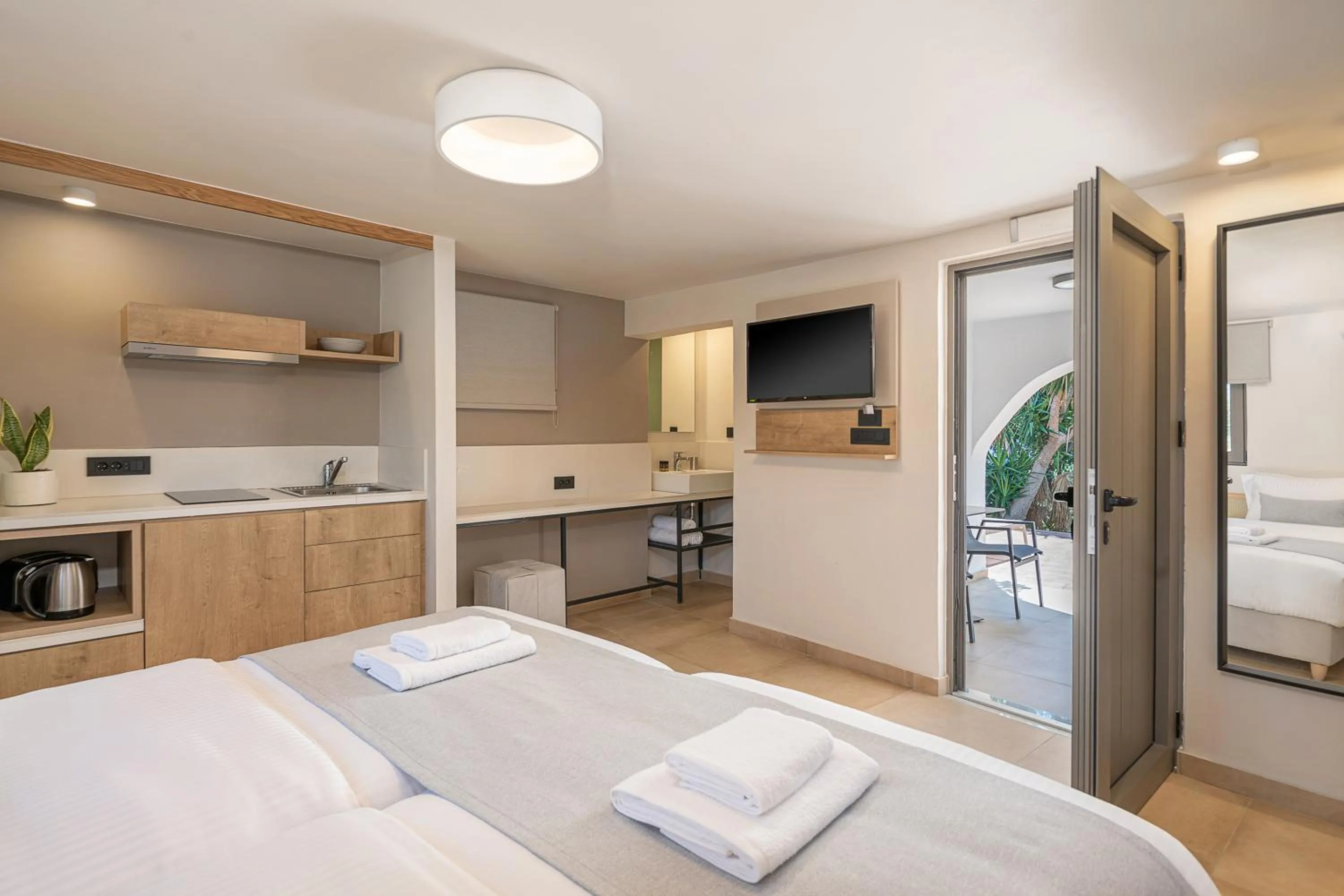 Kitchen or kitchenette, Bed in Elafonisi Resort by Kalomirakis Family