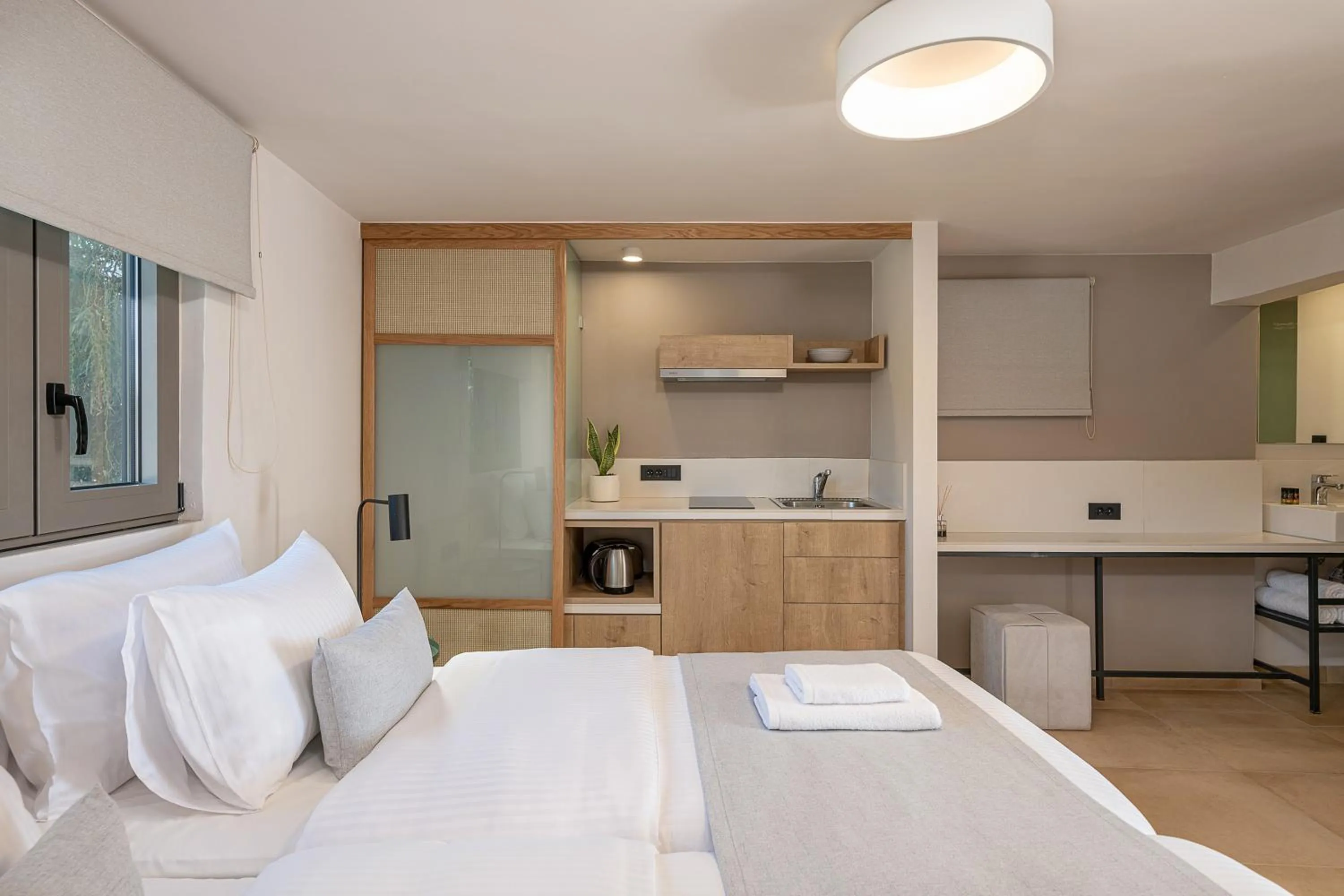 Kitchen or kitchenette, Bed in Elafonisi Resort by Kalomirakis Family