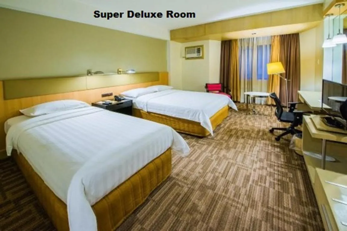 Bed in L'Fisher Hotel Bacolod