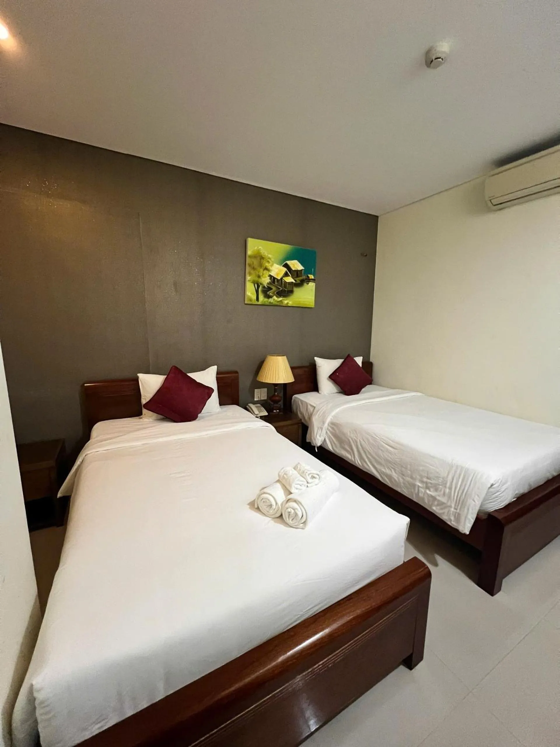 Bed in Doha Central Bliss Danang Hotel by Haviland