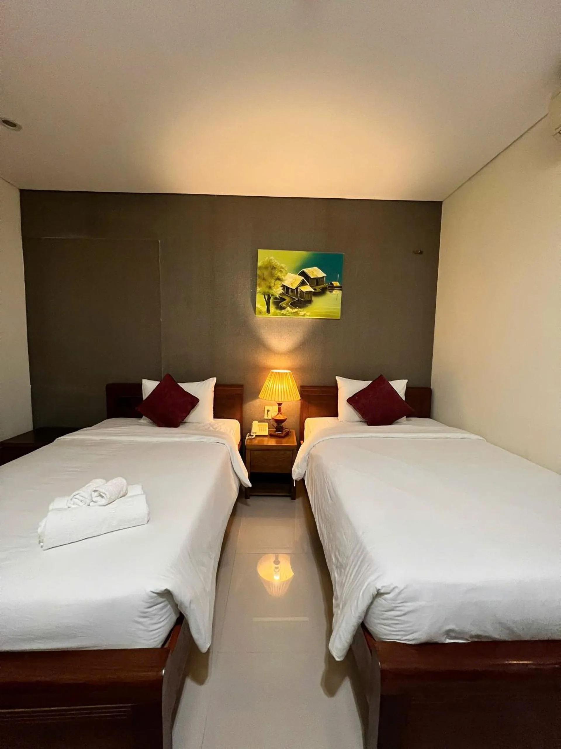 Bed in Doha Central Bliss Danang Hotel by Haviland