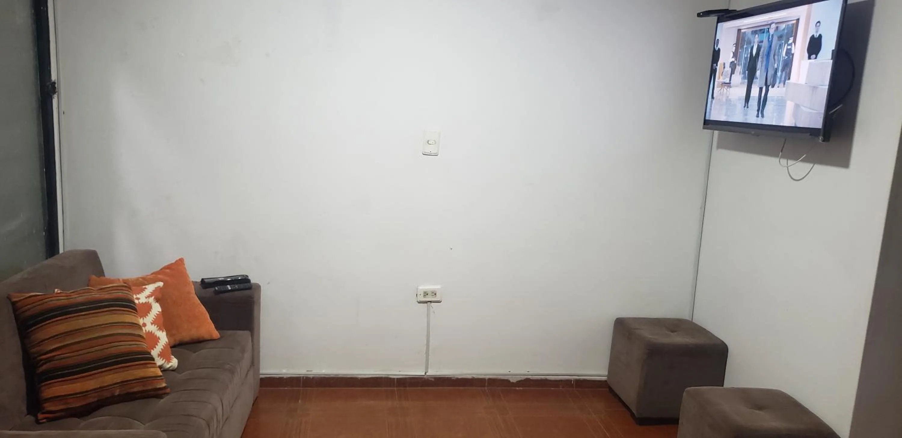 Communal lounge/ TV room in Mom's house Colombia