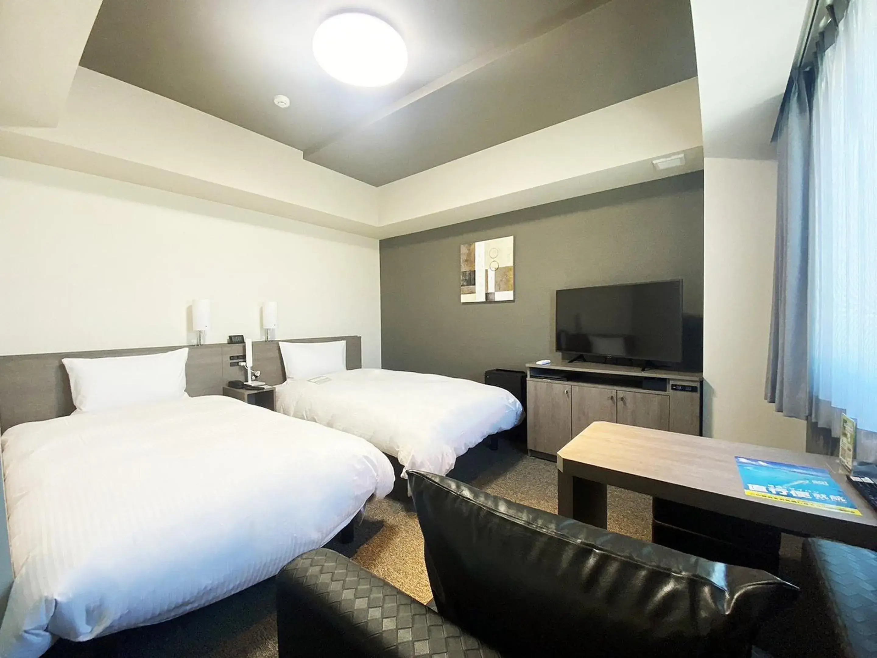 Standard Twin Room - single occupancy - Smoking in Hotel Route Inn Matsuyama -Katsuyama Dori- Standard Twin Room - single occupancy - Smoking in Hotel Route Inn Matsuyama -Katsuyama Dori-