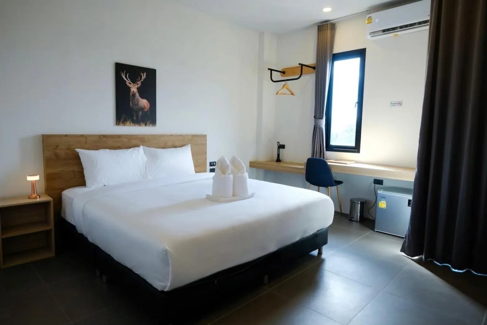 Bed in Double J Hotel