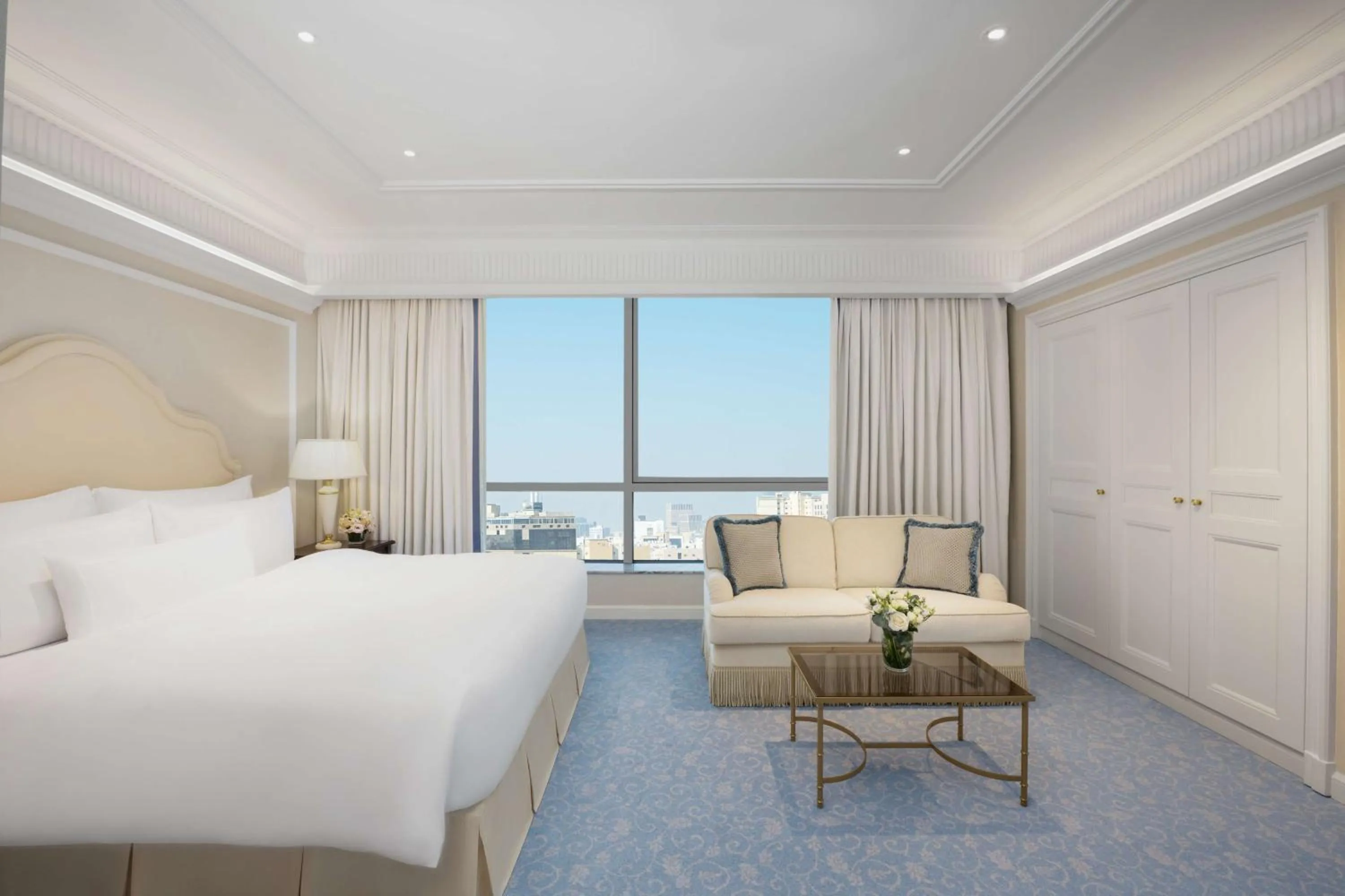 Living room, Bed in The Plaza Doha, LXR Hotels & Resorts