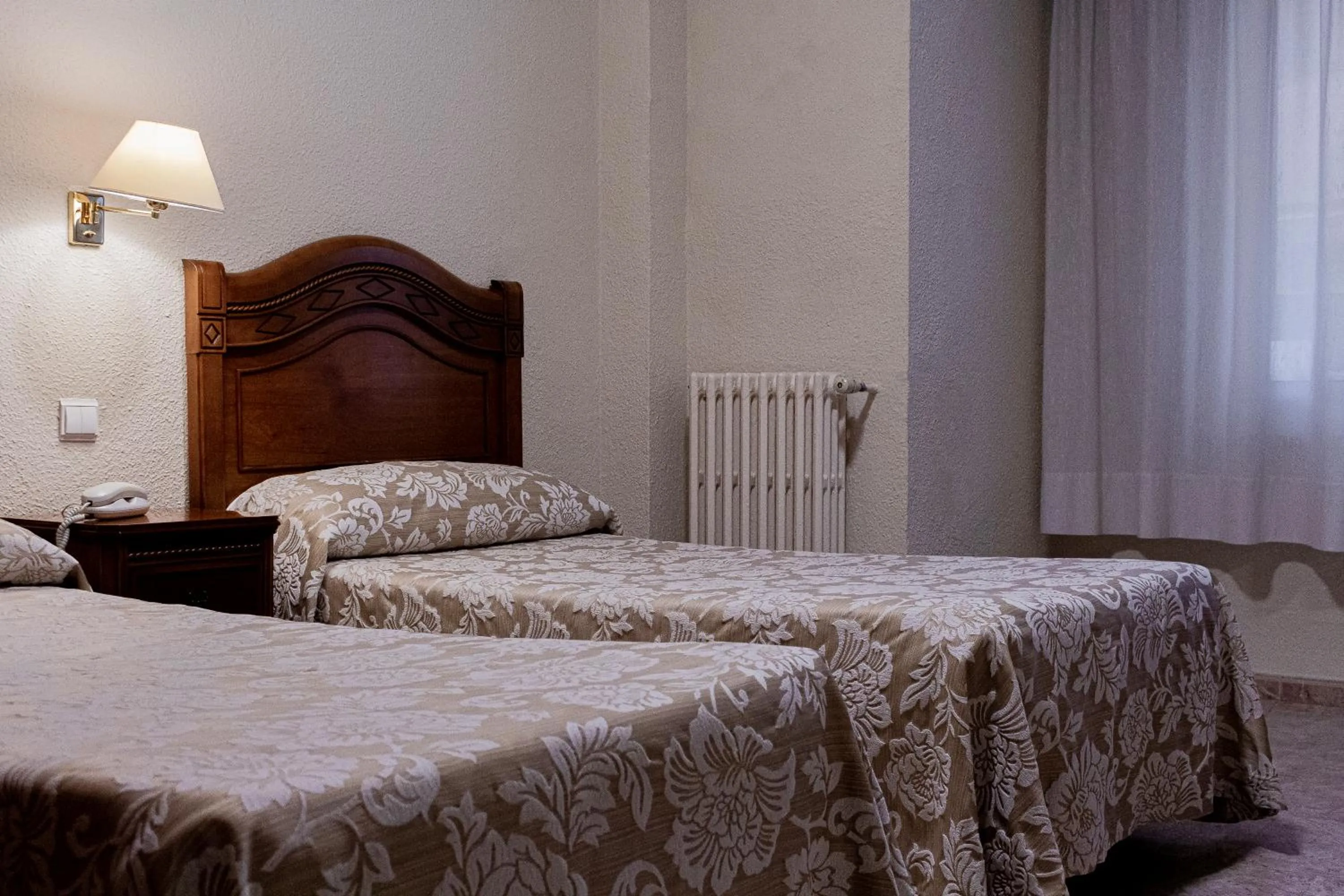 Bed in Hotel Riviera