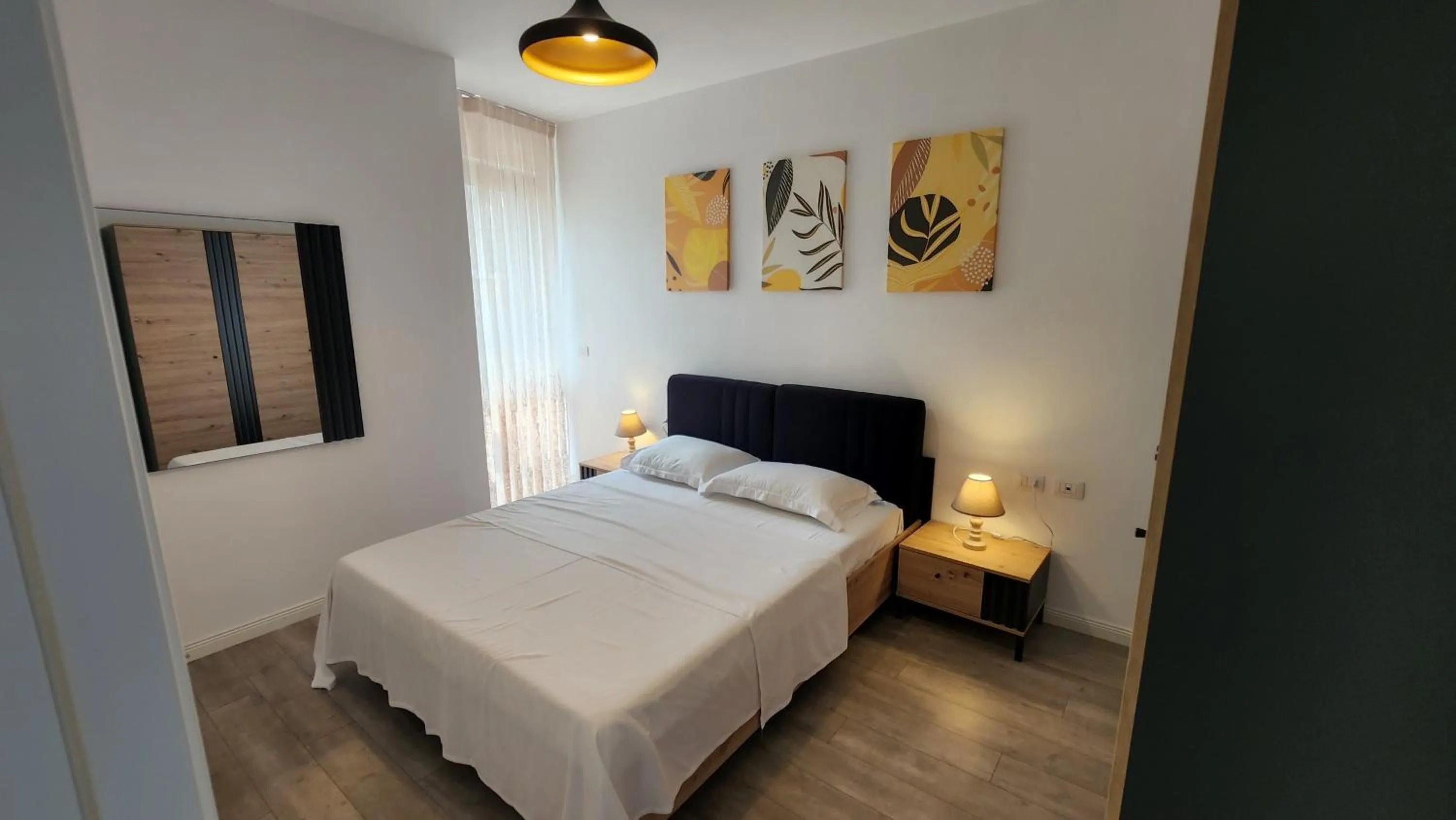 Bed in Kalpazo Home Tirana 21