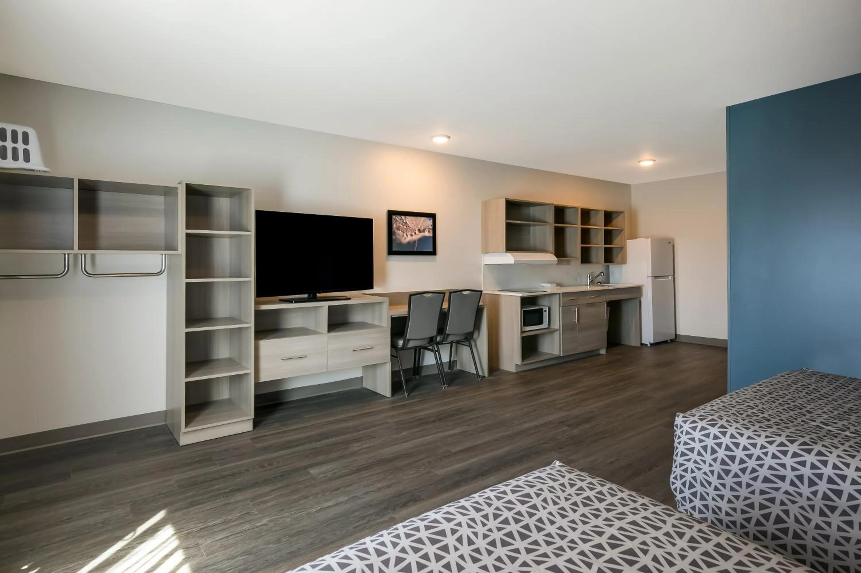 Photo of the whole room in WoodSpring Suites Morrisville - Raleigh Durham Airport