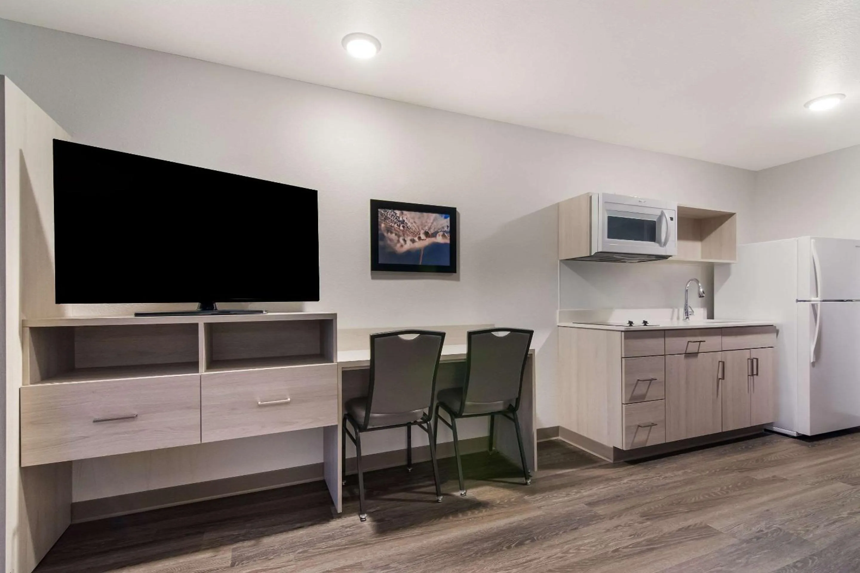 TV and multimedia in WoodSpring Suites Morrisville - Raleigh Durham Airport