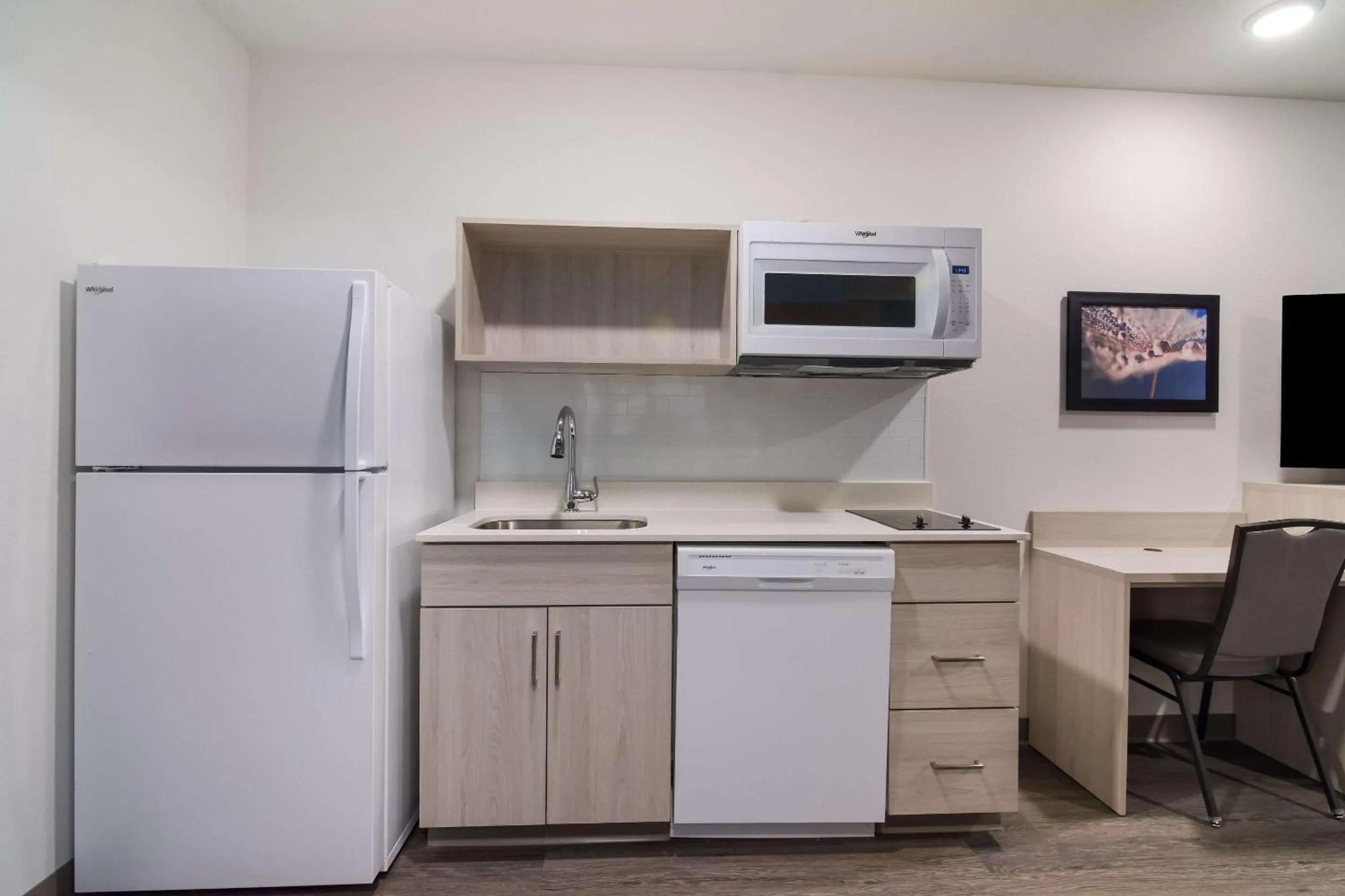 Kitchen or kitchenette in WoodSpring Suites Morrisville - Raleigh Durham Airport