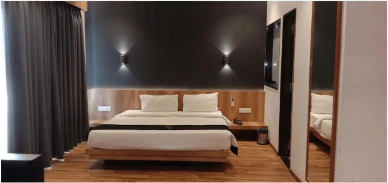 Bed in TGN SUITES - HOTEL