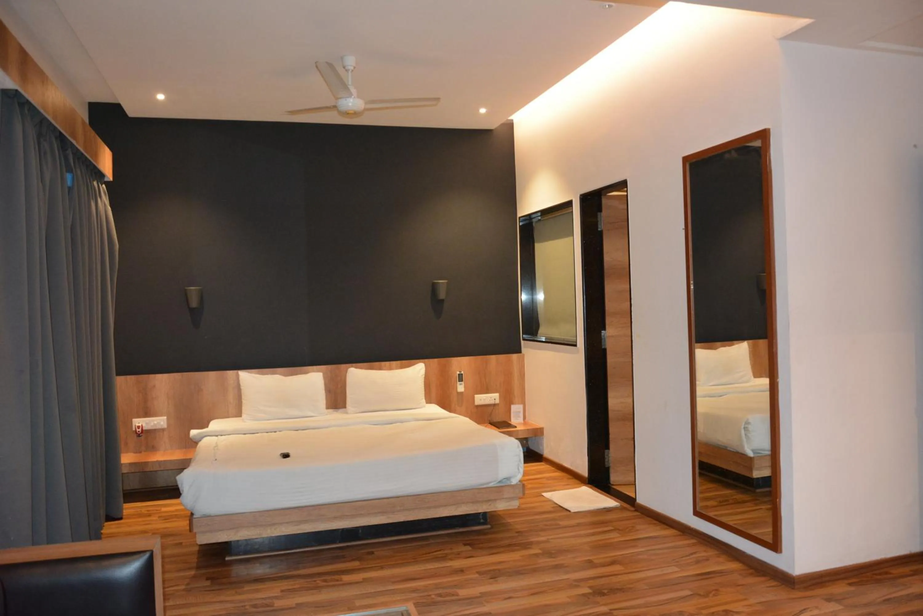 Bed in TGN SUITES - HOTEL