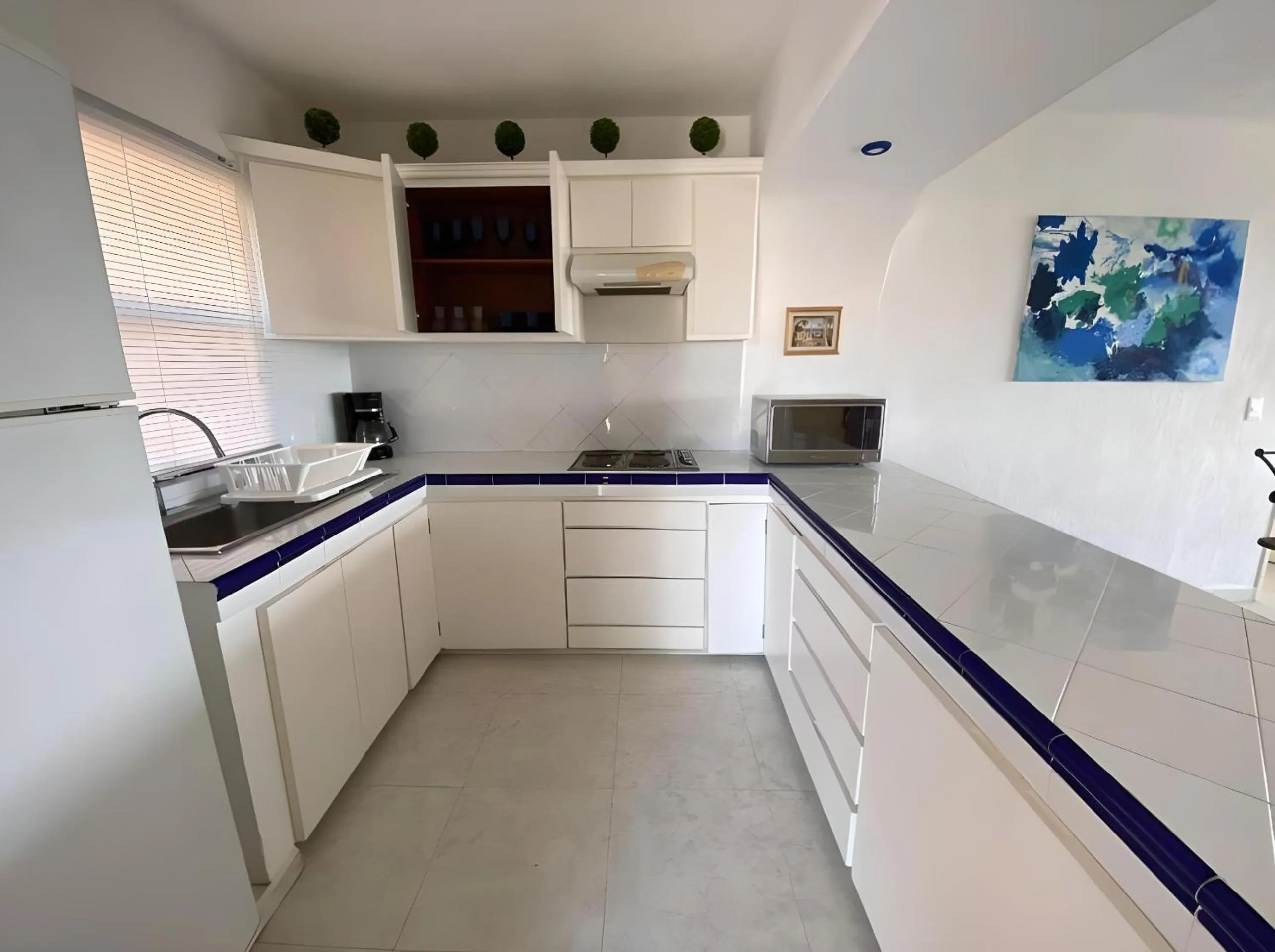 Kitchen or kitchenette in Villas Tropical By Andiani