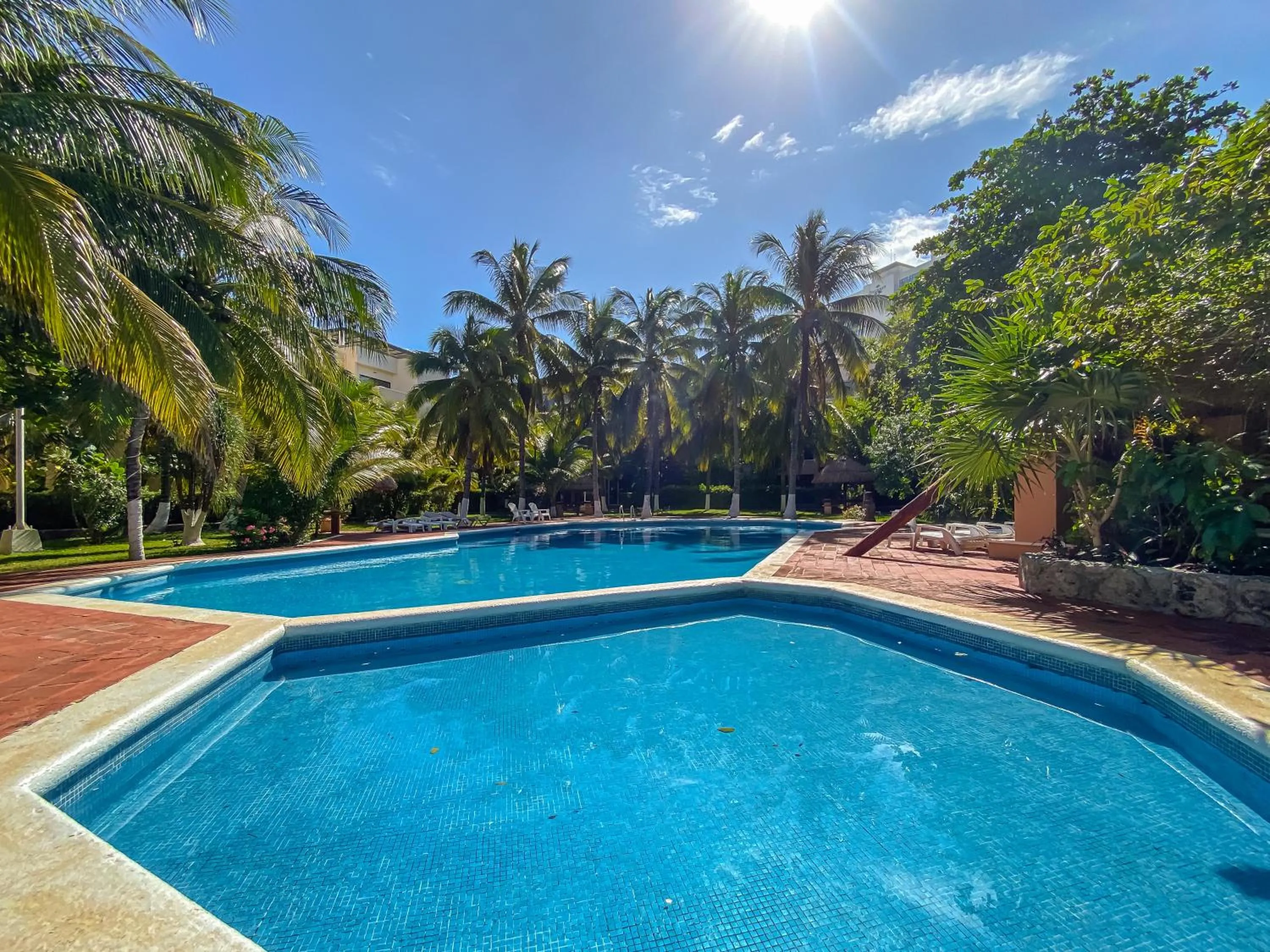 Swimming pool in Villas Tropical By Andiani