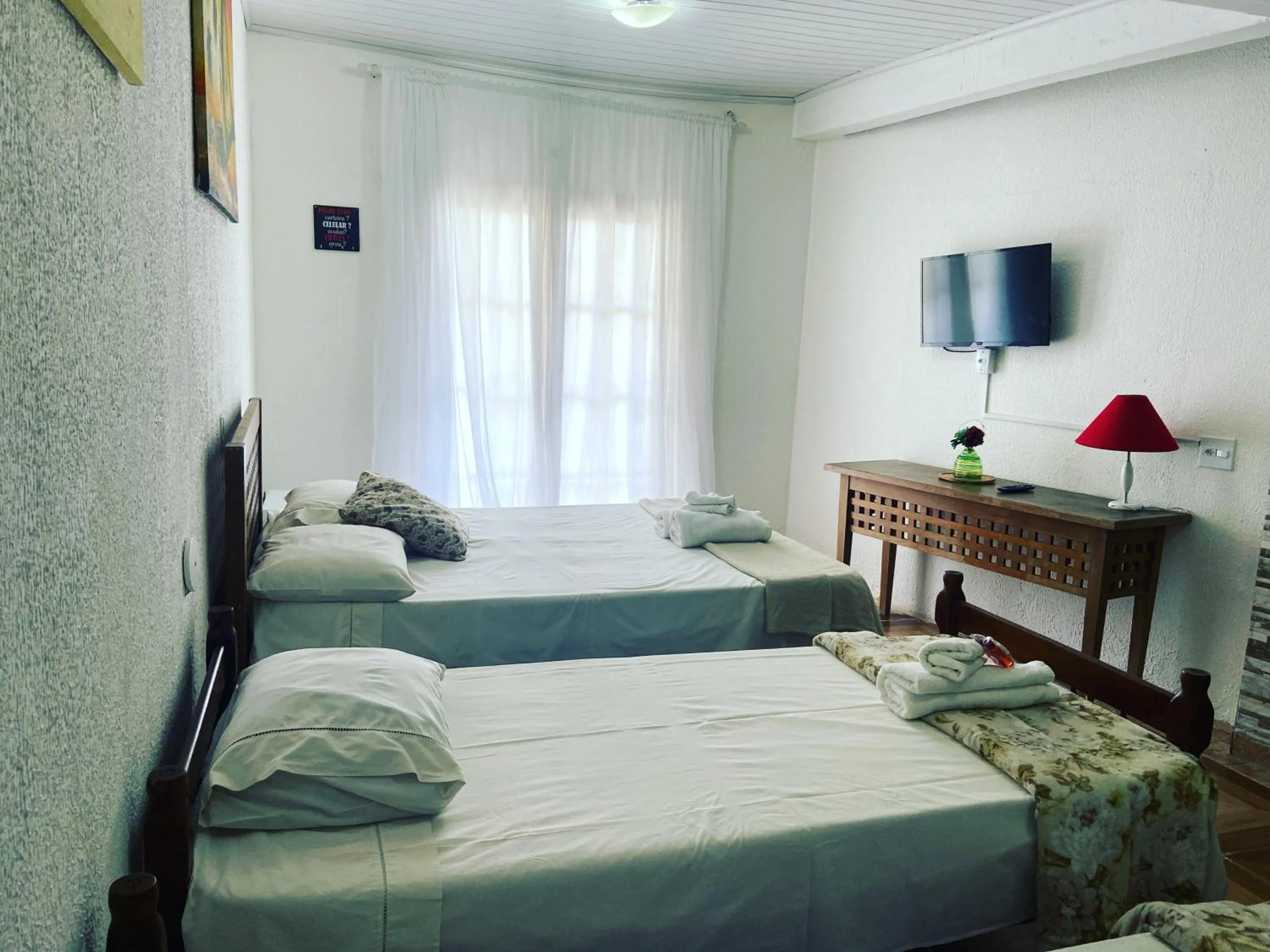 Photo of the whole room, Bed in Pousada Maresias de Geribá