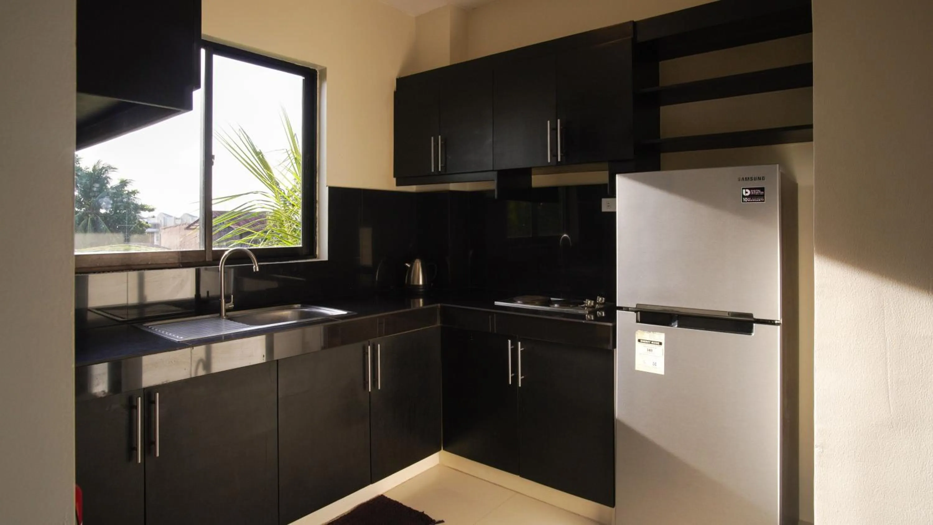 Kitchen or kitchenette in Garden Vista Hotel