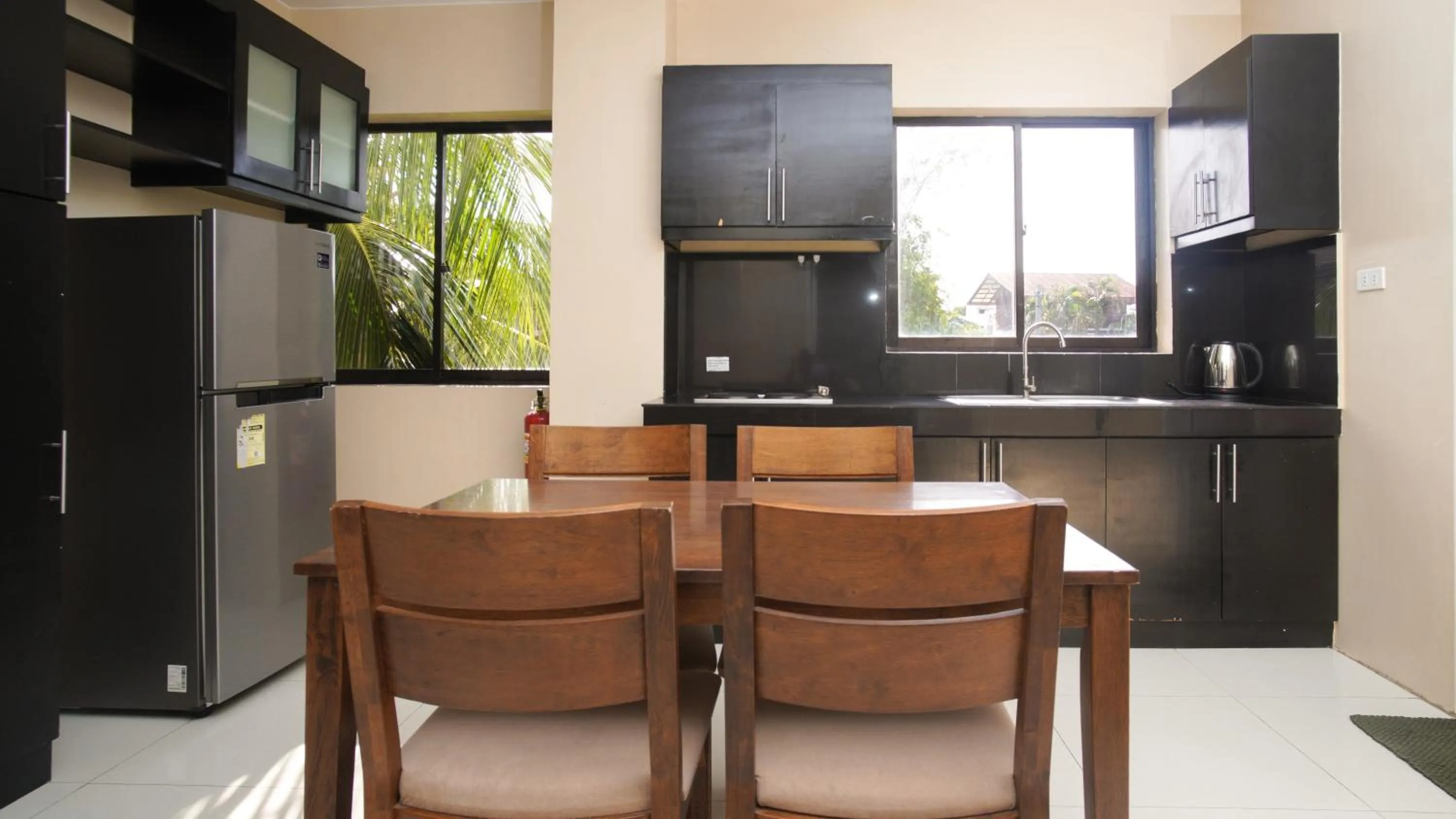 Kitchen or kitchenette in Garden Vista Hotel