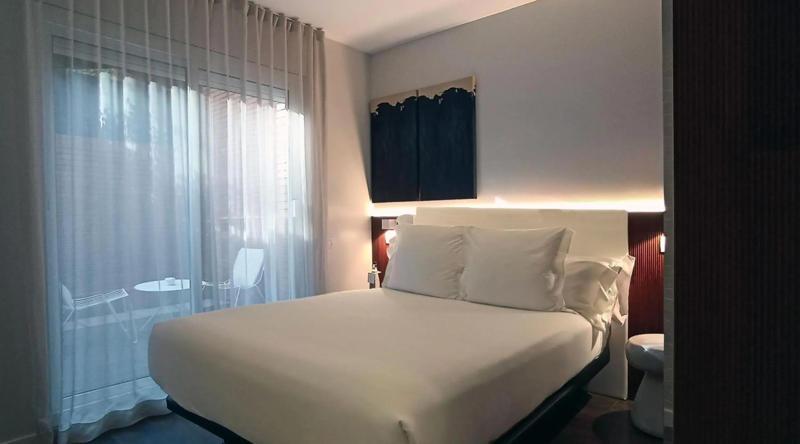 Balcony/Terrace, Bed in Hotel Balmes, a member of Preferred Hotels & Resorts