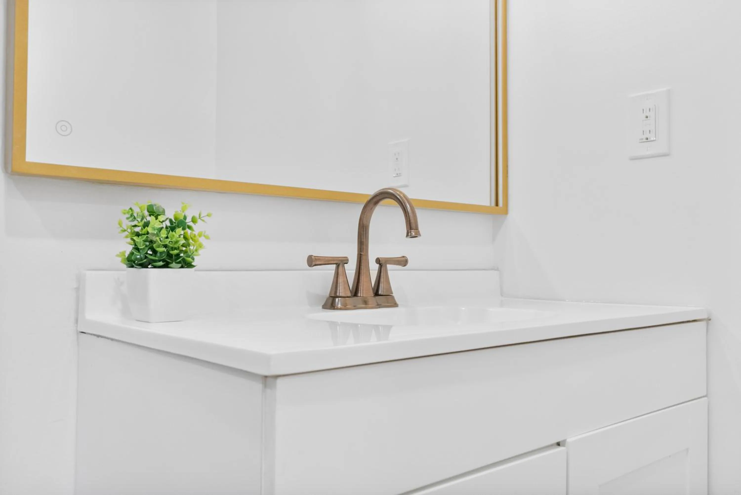 Bathroom in Upscale Luxury Suites Minutes From Center City