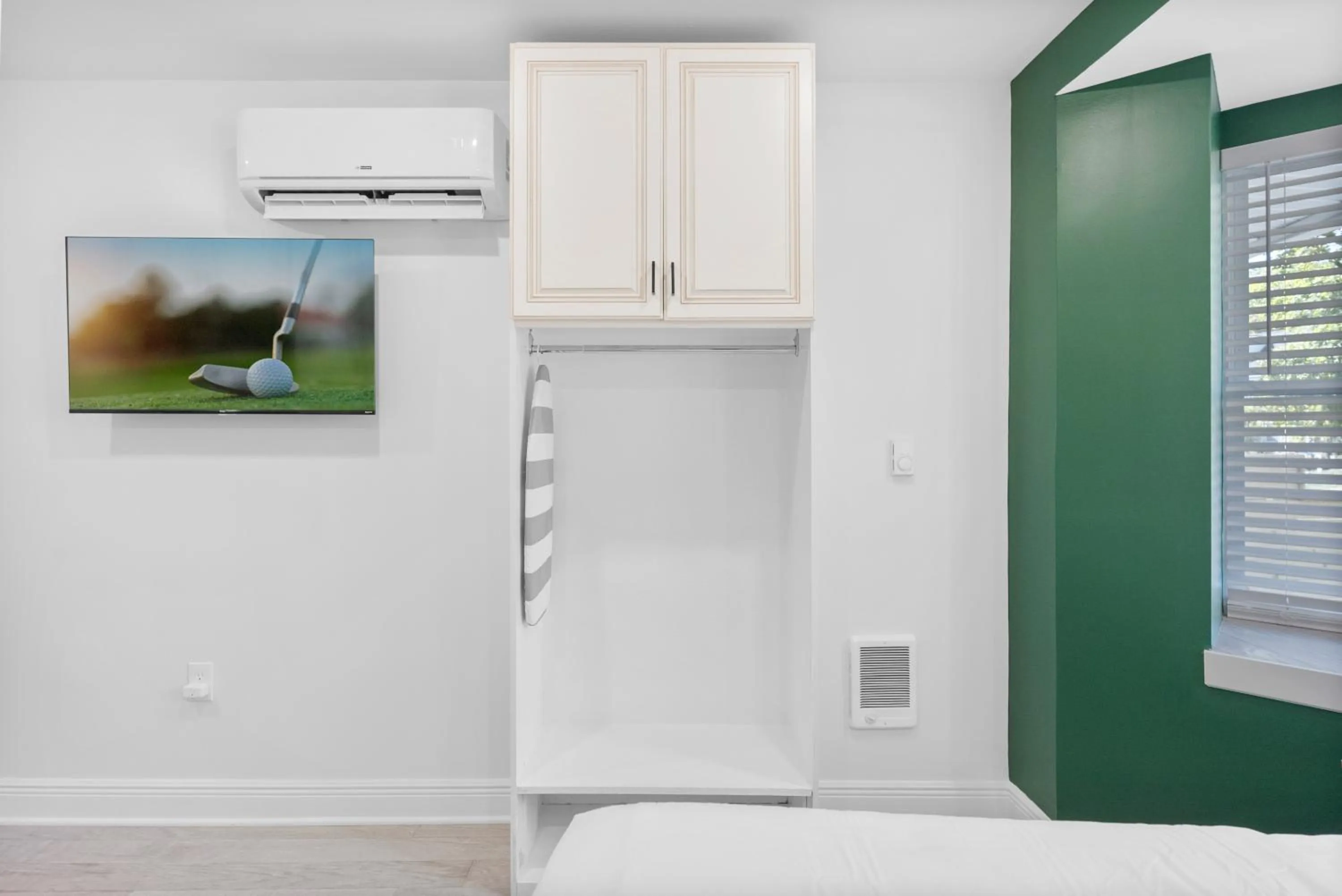 Bedroom in Upscale Luxury Suites Minutes From Center City