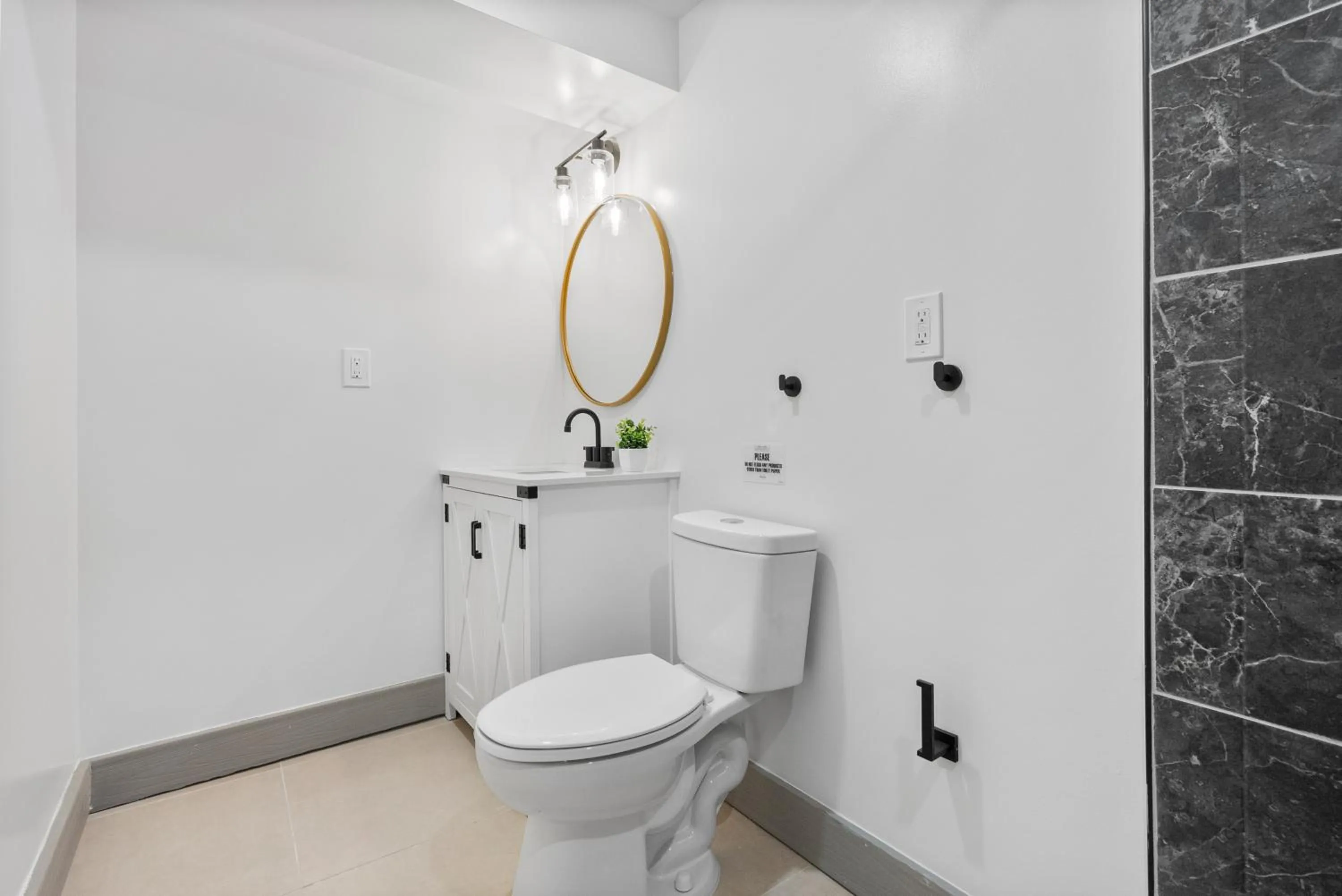 Bathroom in Upscale Luxury Suites Minutes From Center City