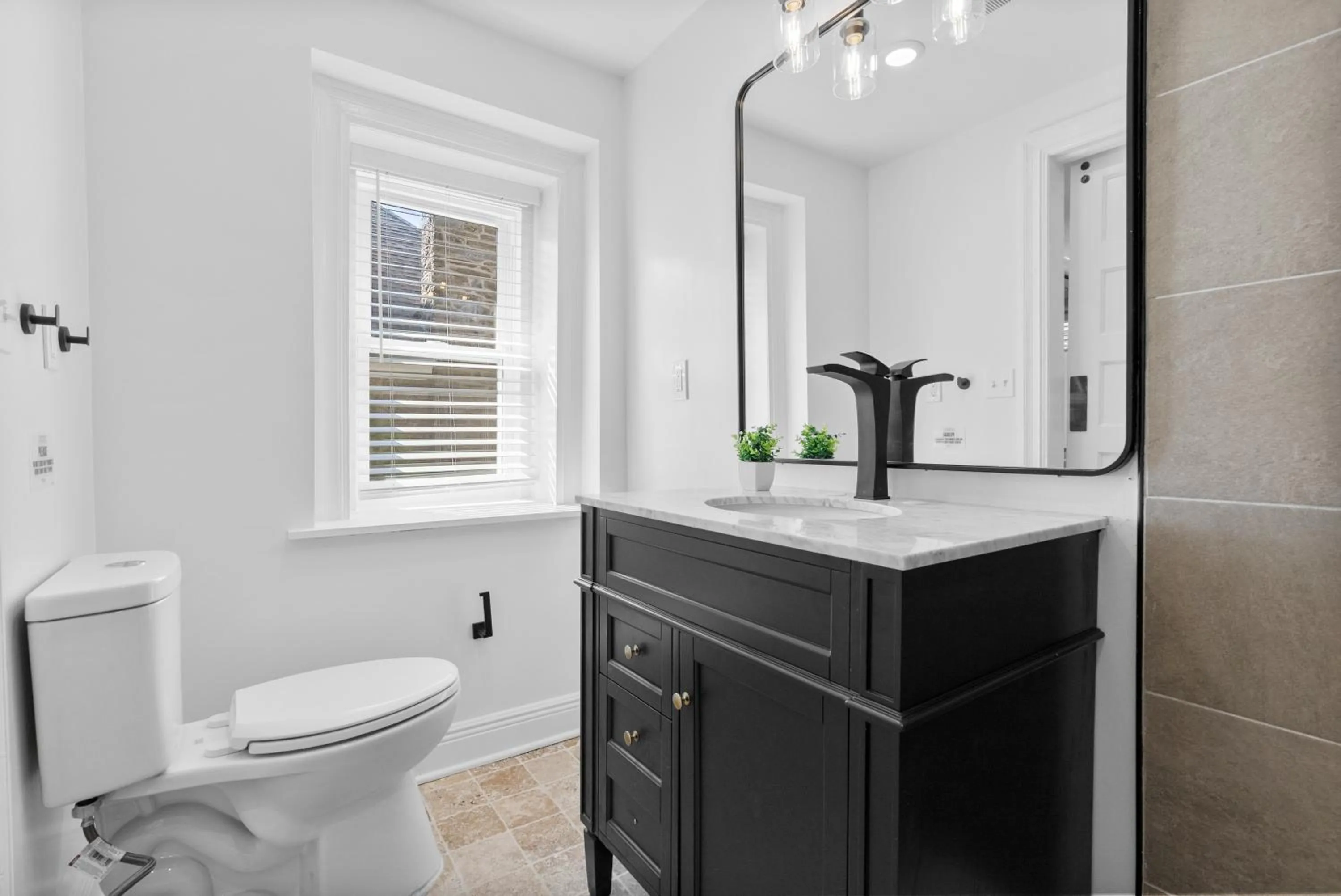 Bathroom in Upscale Luxury Suites Minutes From Center City