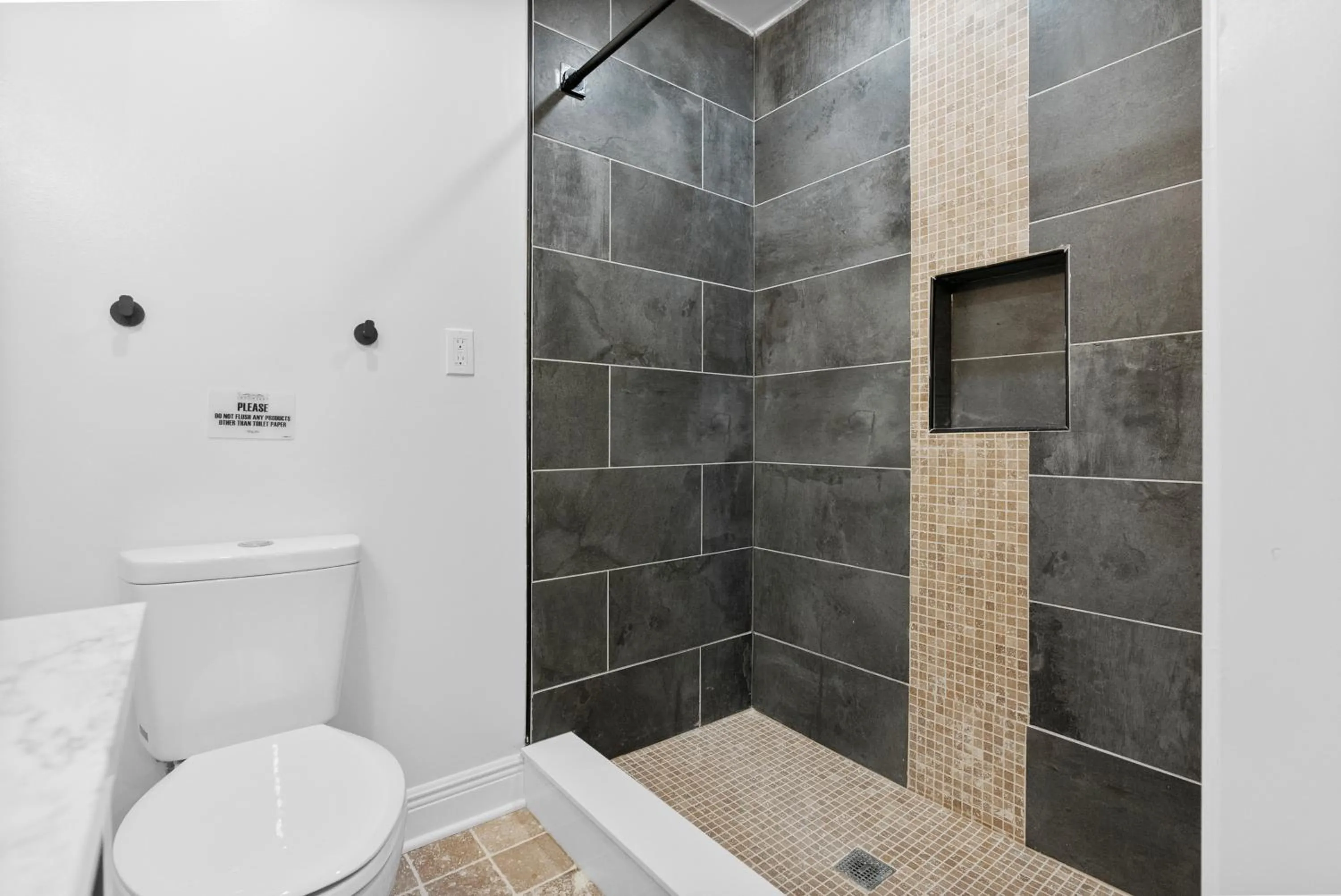 Bathroom in Upscale Luxury Suites Minutes From Center City