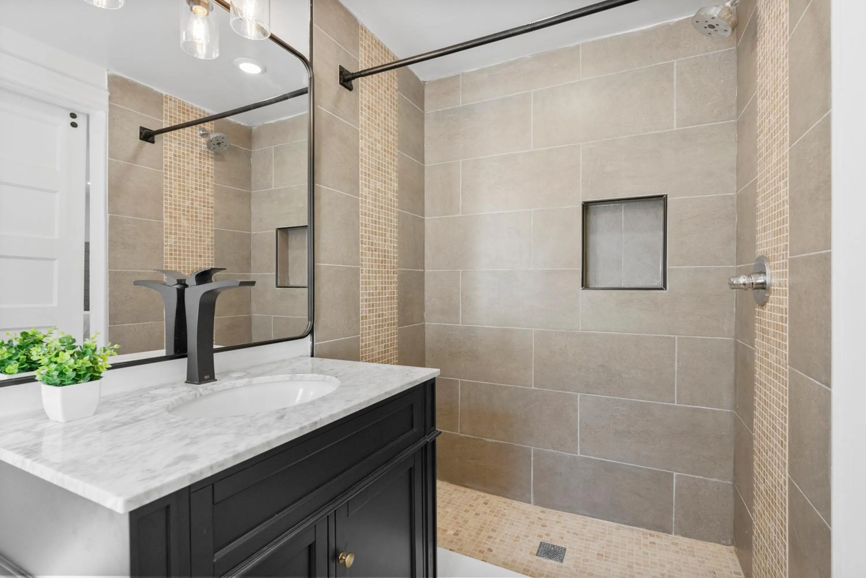 Bathroom in Upscale Luxury Suites Minutes From Center City