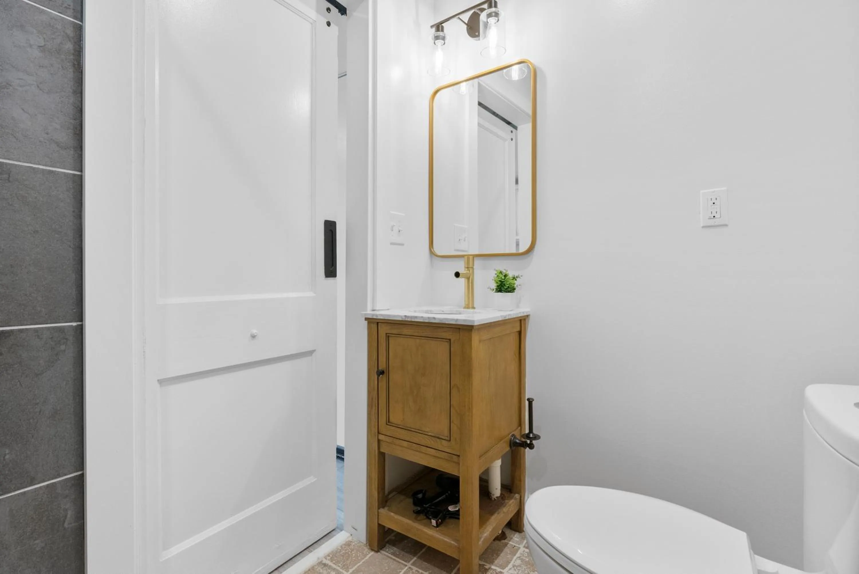 Bathroom in Upscale Luxury Suites Minutes From Center City