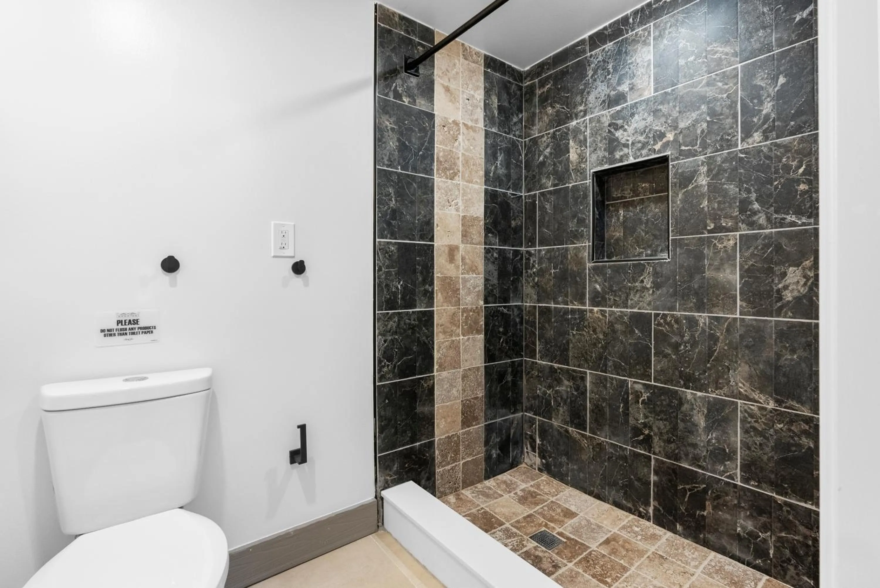 Bathroom in Upscale Luxury Suites Minutes From Center City