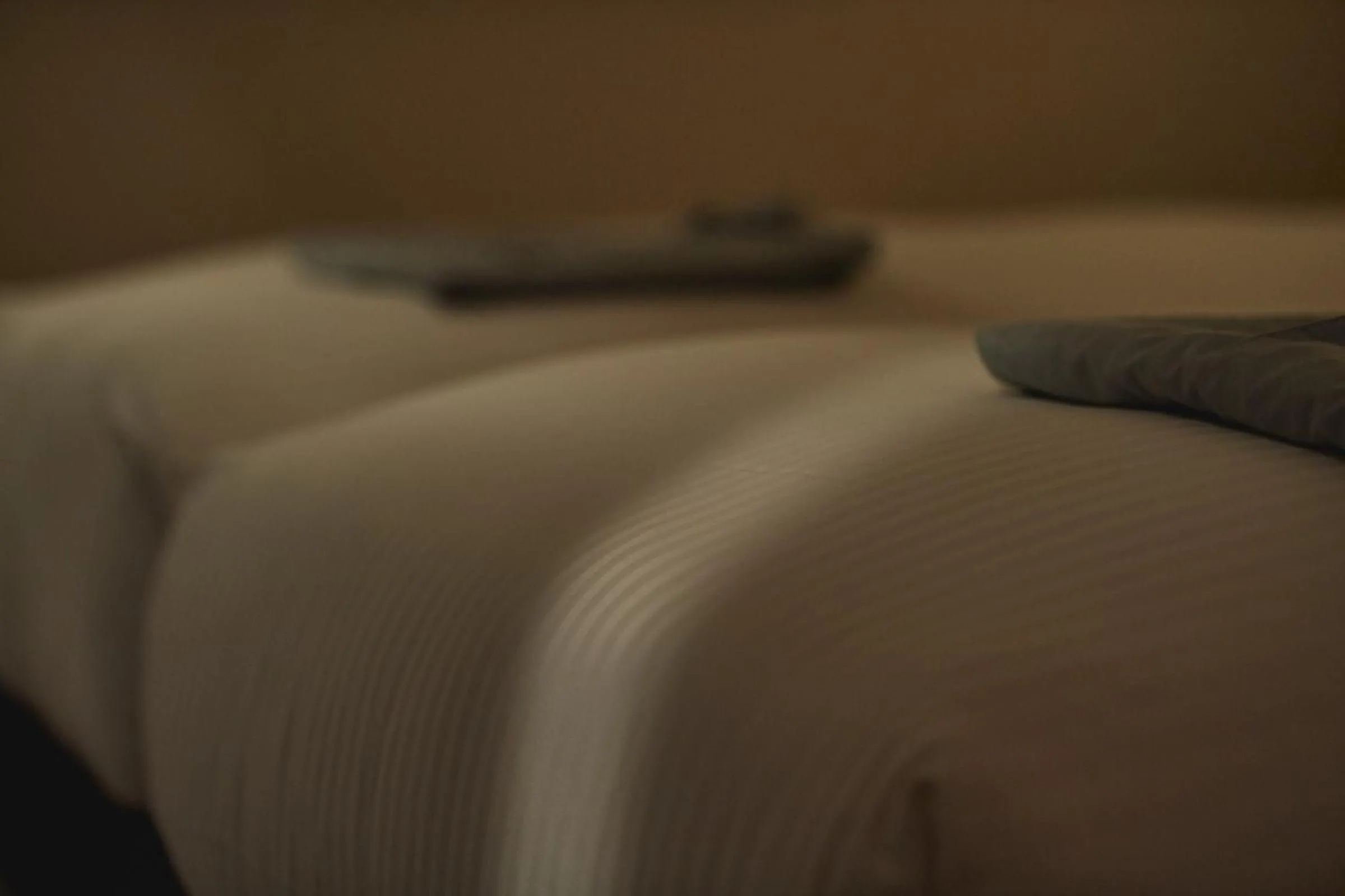 Bed in THE HOTELS HAKATA Harushige SHINKAN