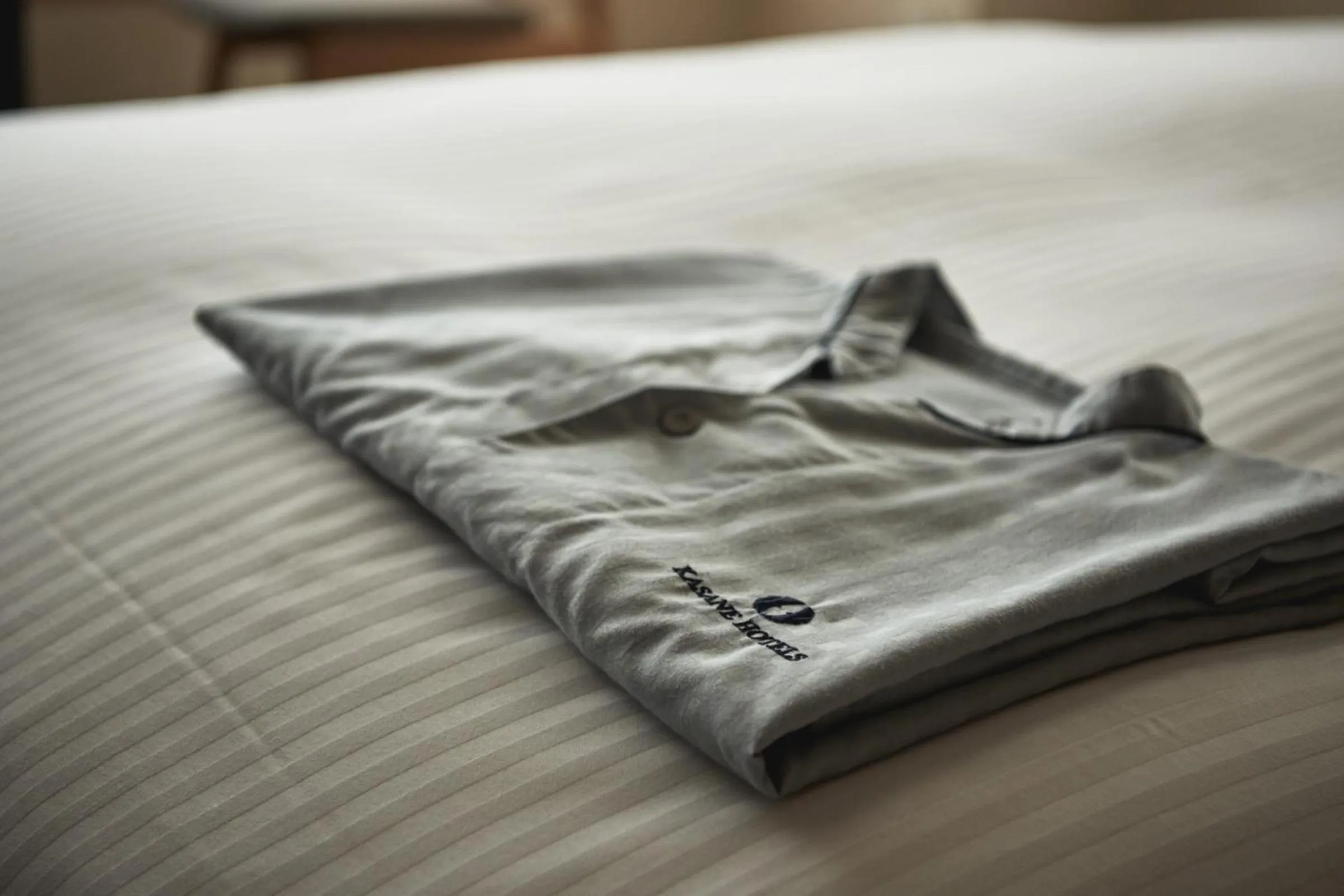 Bed in THE HOTELS HAKATA Harushige SHINKAN