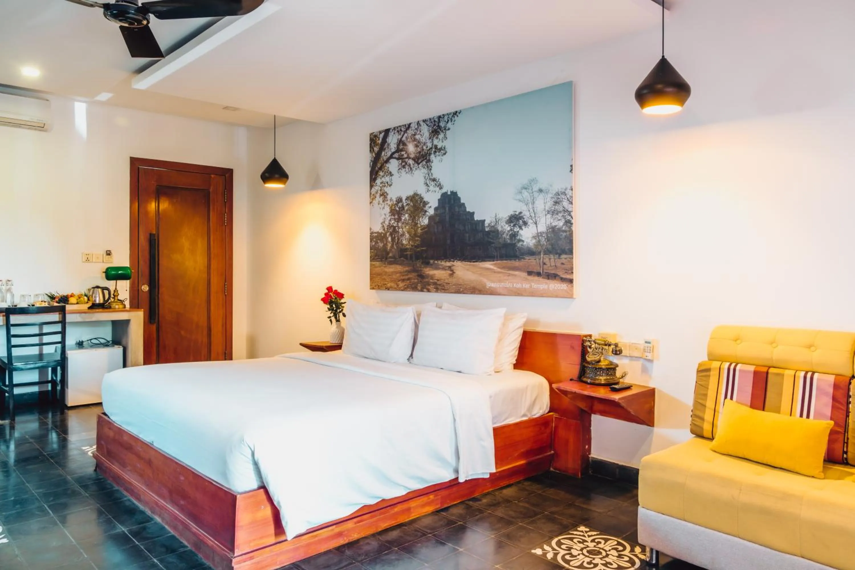 Photo of the whole room, Bed in Bopha Watbo Residence