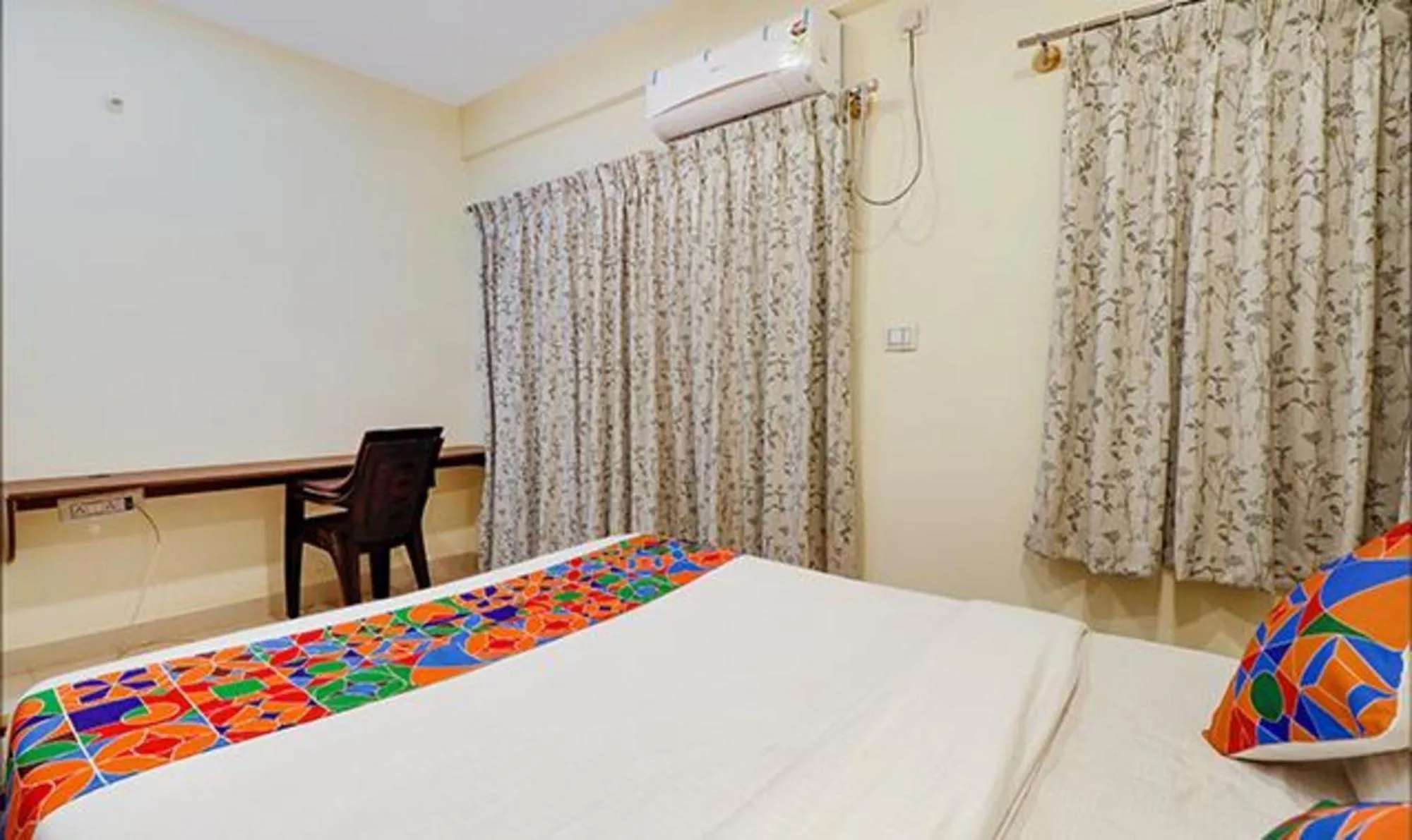 Bed in Via Kings Suites