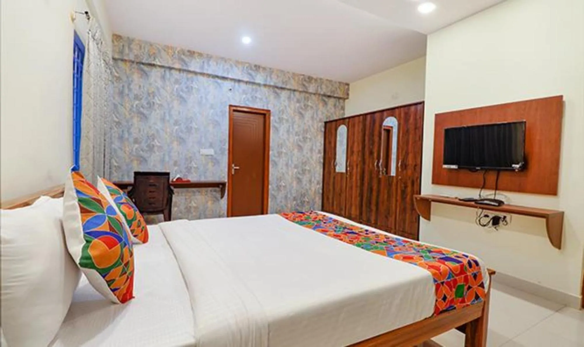 Bed in Via Kings Suites