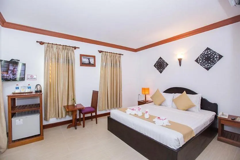 Photo of the whole room, Bed in Angkor Leap Hotel