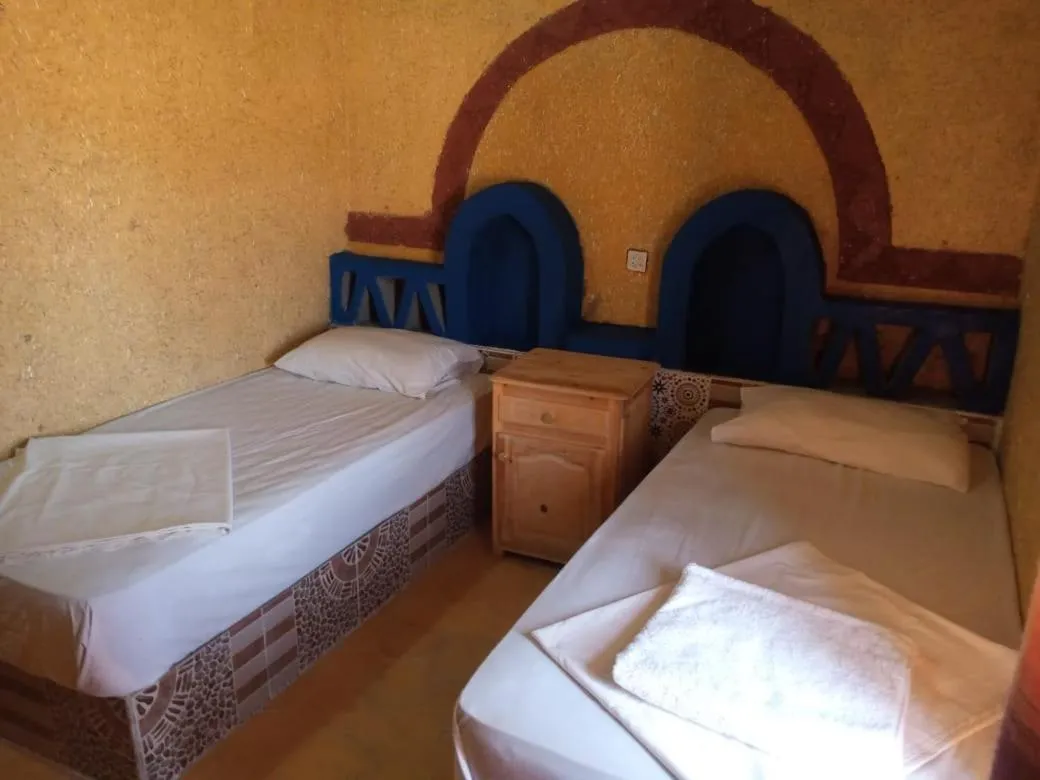 Bed in Les Pyramides Hotel Merzouga