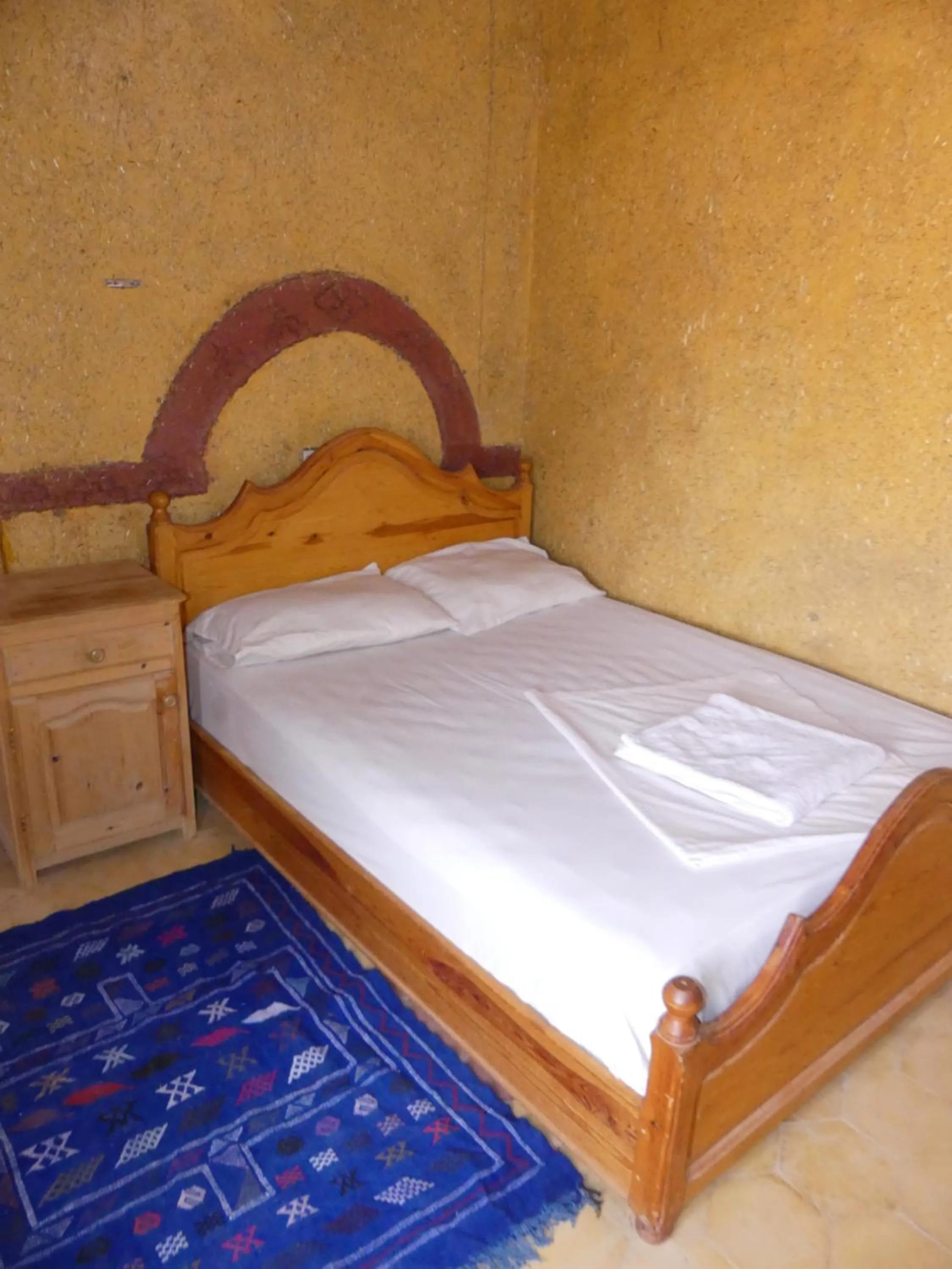 Bed in Les Pyramides Hotel Merzouga