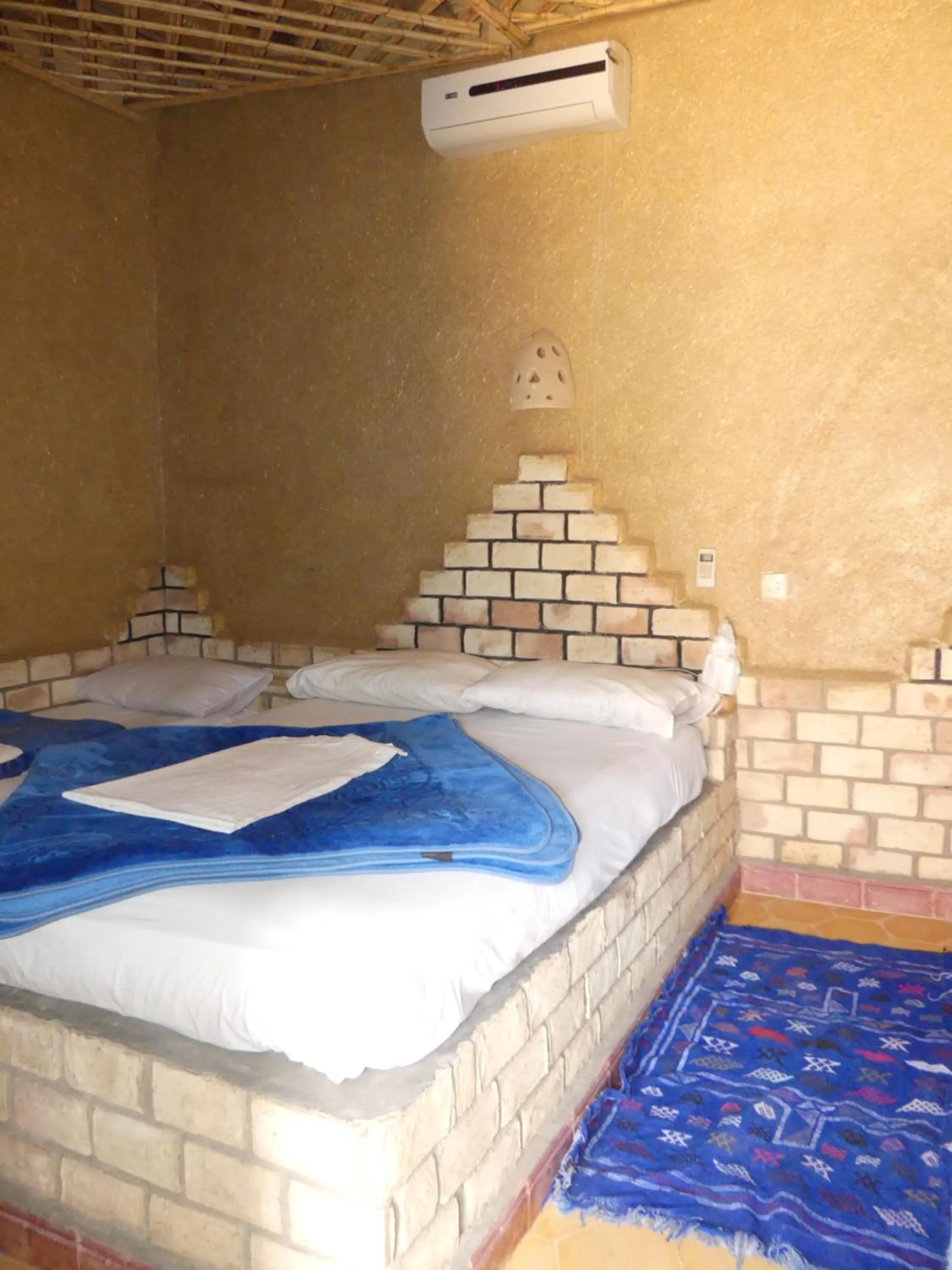 Bed in Les Pyramides Hotel Merzouga