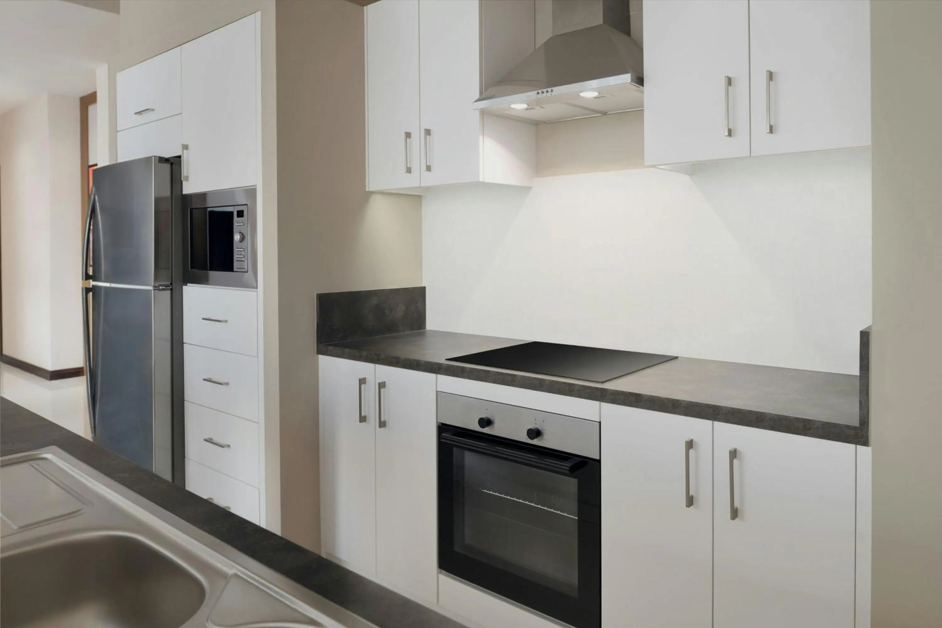Kitchen or kitchenette in Delta Hotels by Marriott City Center Doha