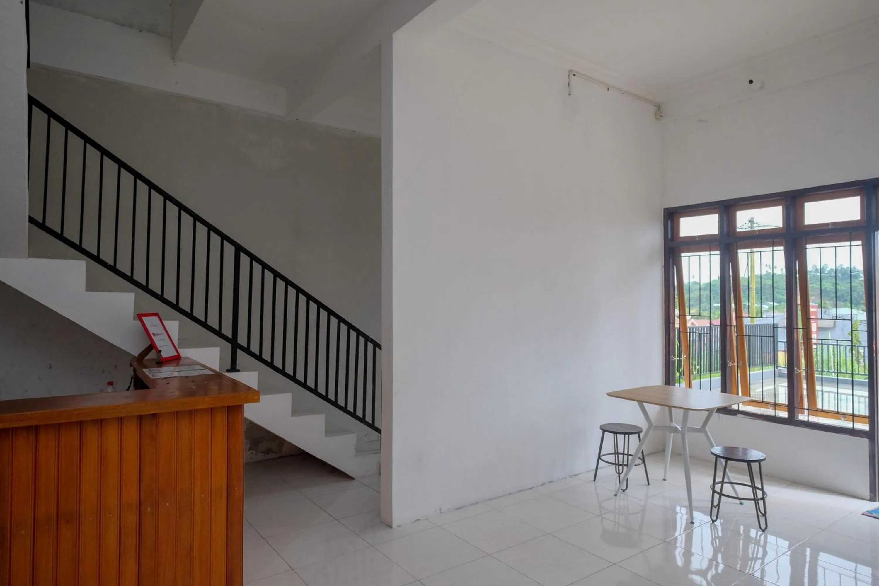 Lobby or reception in RedDoorz near De La Salle Manado