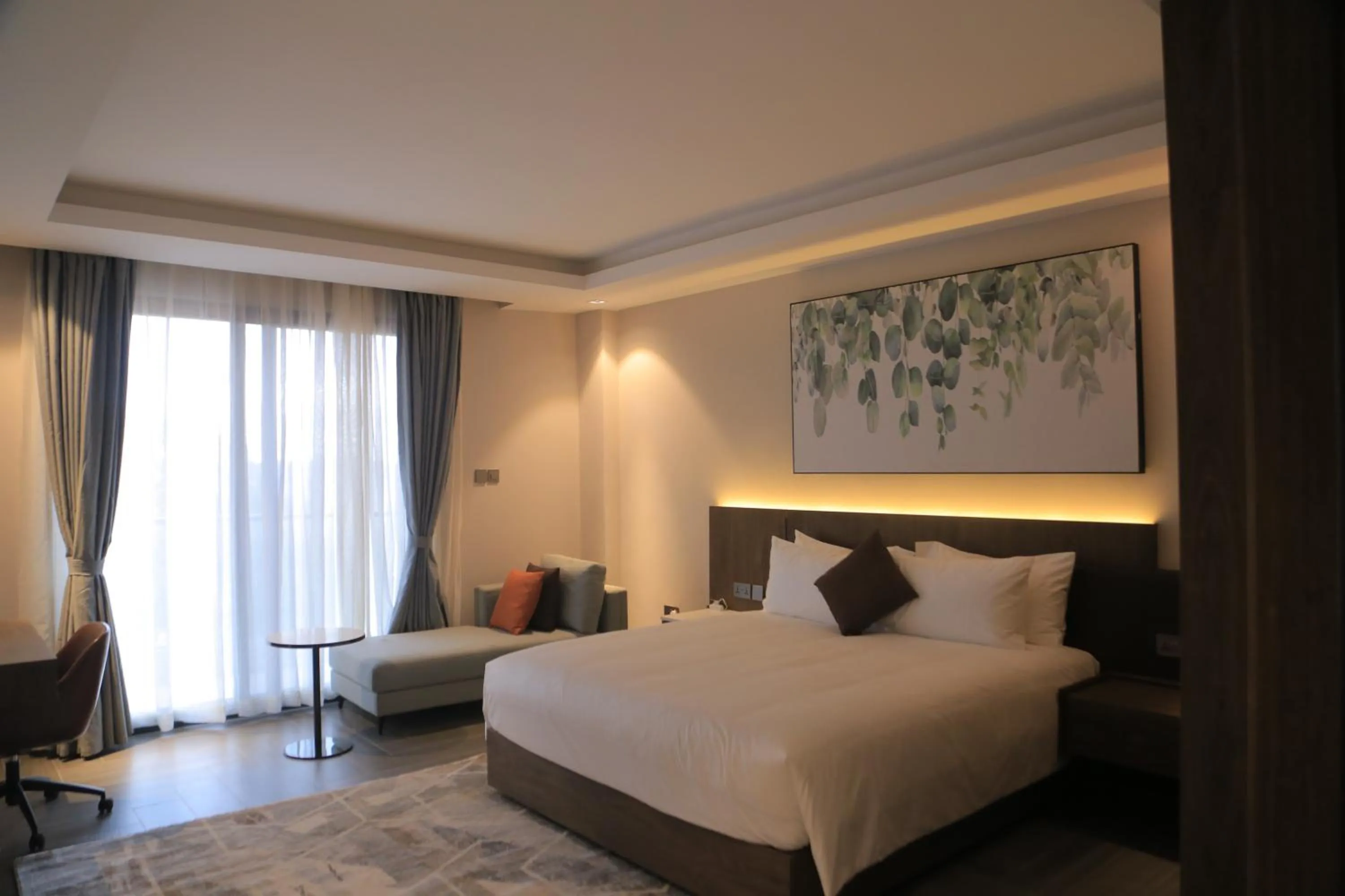 Bed in Zara Garden Hotel and Apartments